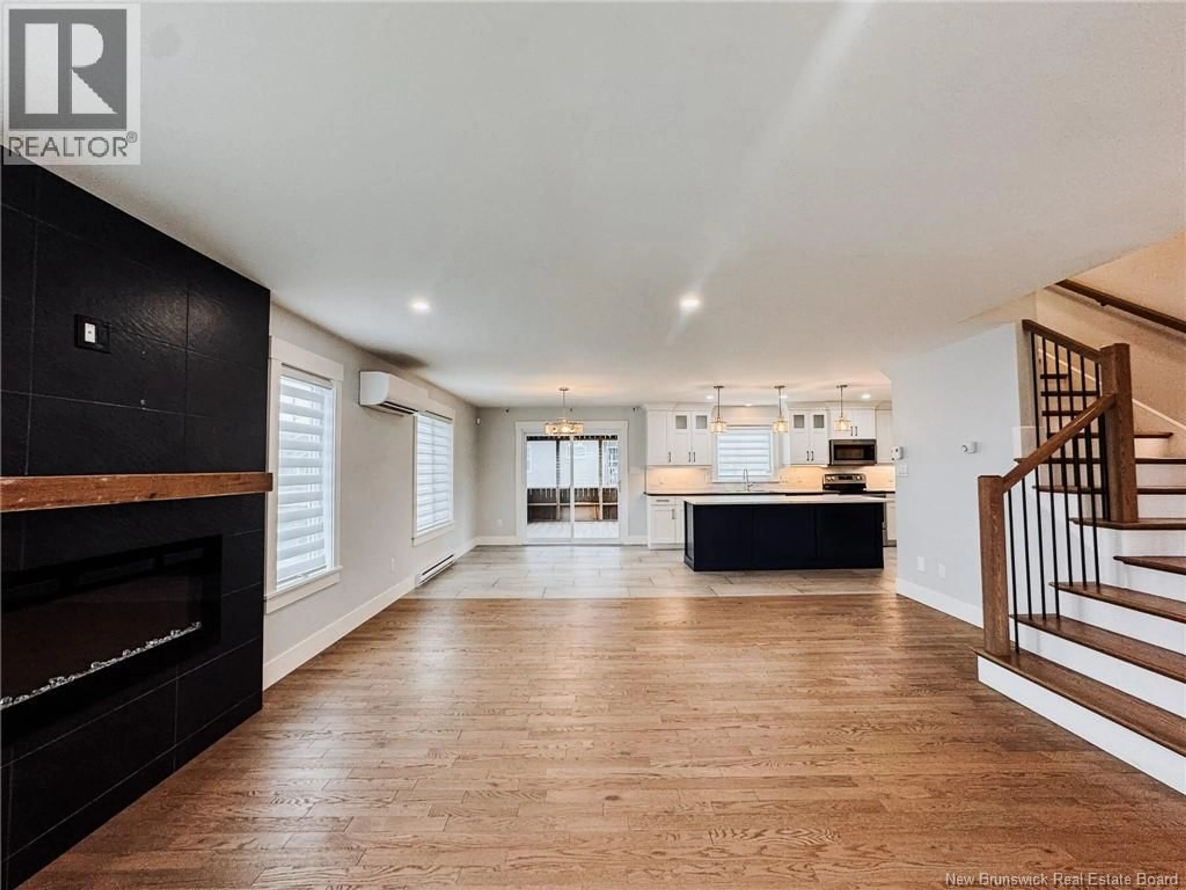 Open concept kitchen, wood/laminate floor for 50 DOIRON, Dieppe New Brunswick E1A0X8