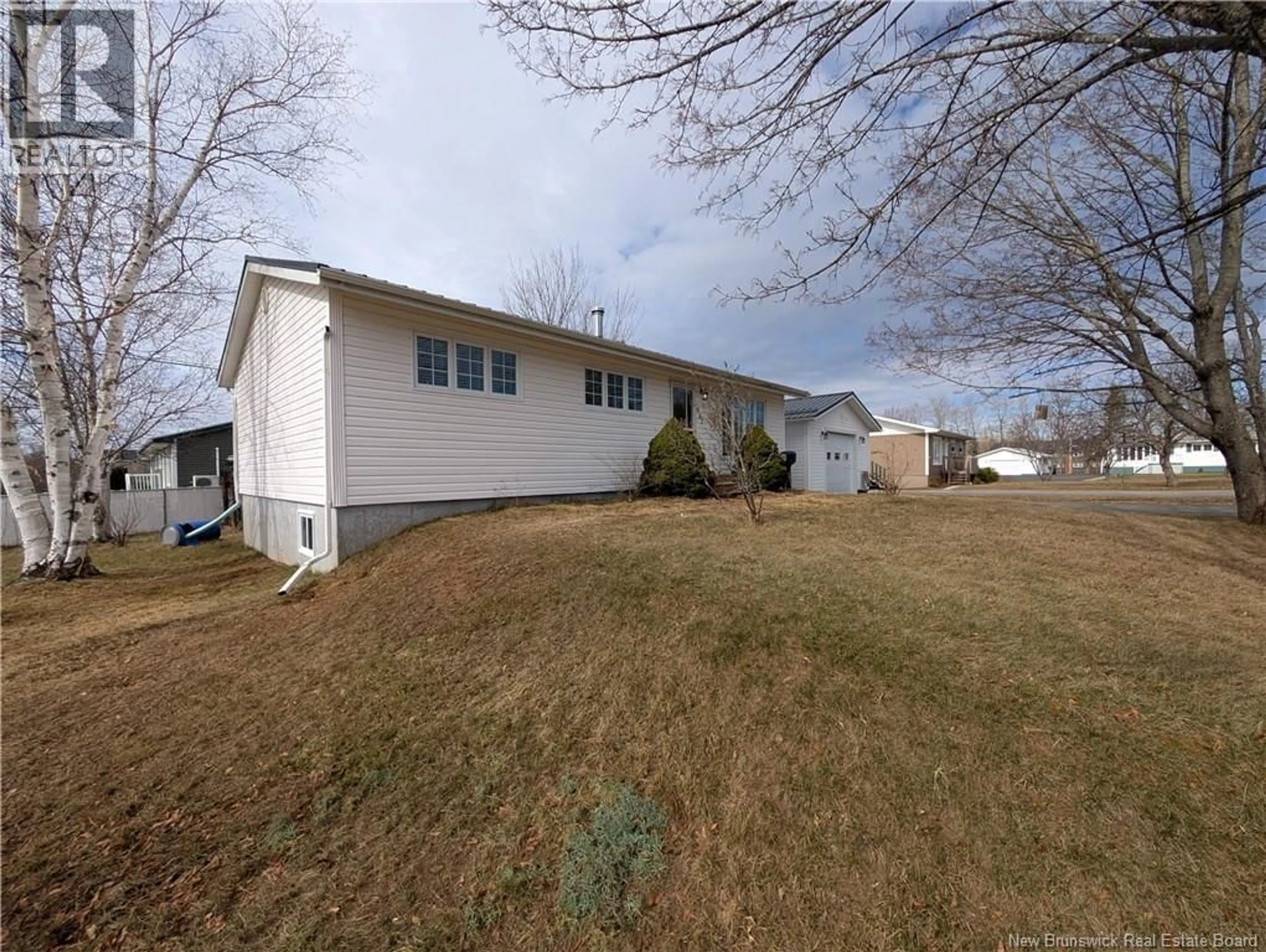 A pic from outside/outdoor area/front of a property/back of a property/a pic from drone, unknown for 562 FLEET, Bathurst New Brunswick E2A4H1