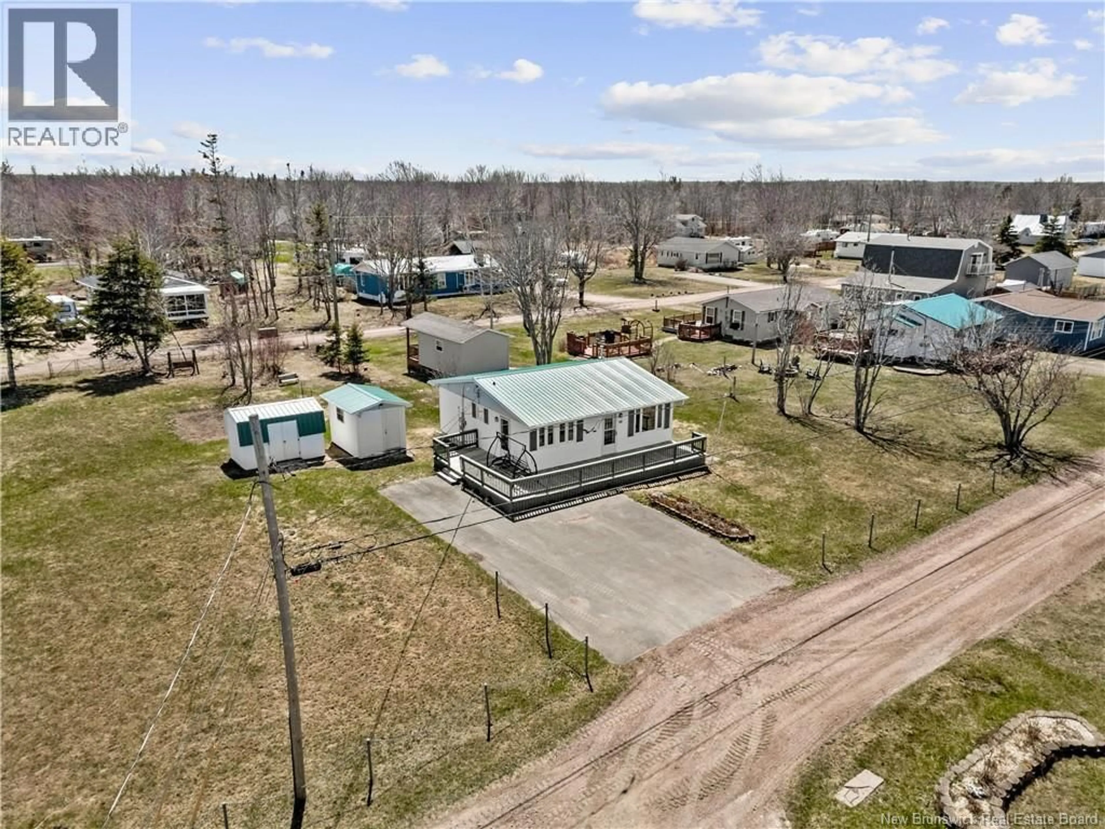 A pic from outside/outdoor area/front of a property/back of a property/a pic from drone, street for 61 BAYBREEZE LANE, Grand-Barachois New Brunswick E4P6W9