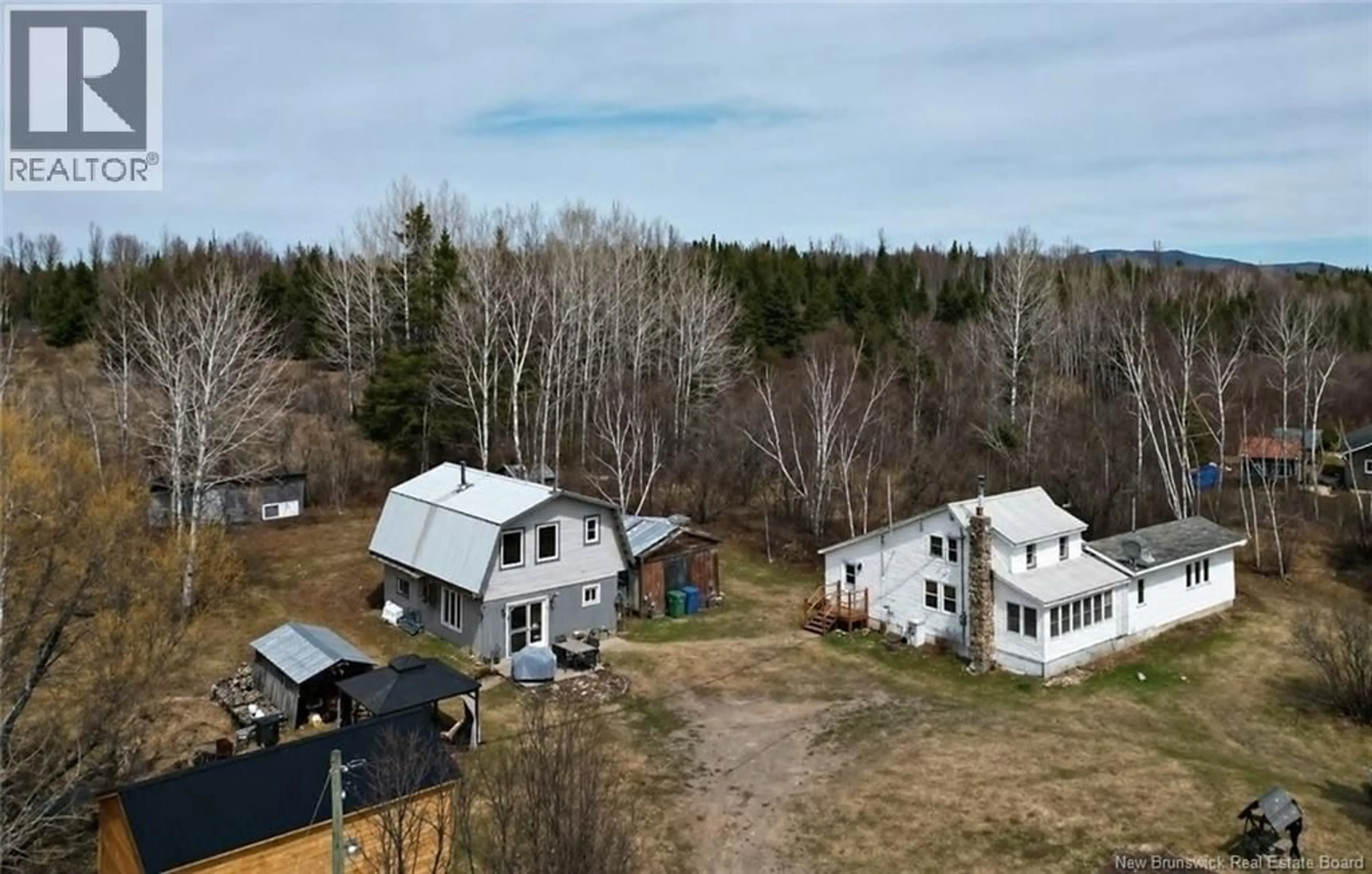 A pic from outside/outdoor area/front of a property/back of a property/a pic from drone, unknown for 845 ROUTE 385, Burntland Brook New Brunswick E7G3M2