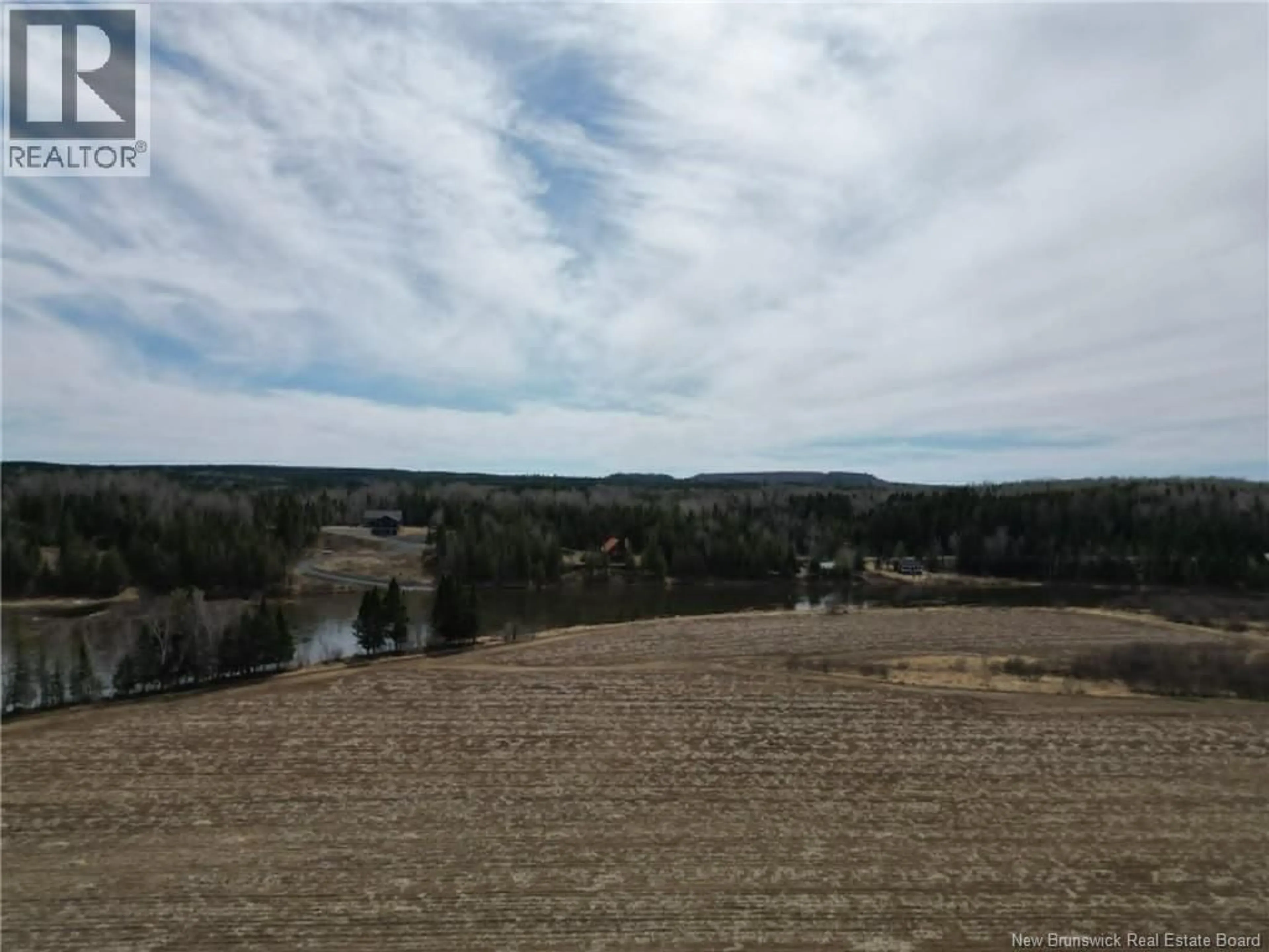 A pic from outside/outdoor area/front of a property/back of a property/a pic from drone, water/lake/river/ocean view for 845 ROUTE 385, Burntland Brook New Brunswick E7G3M2