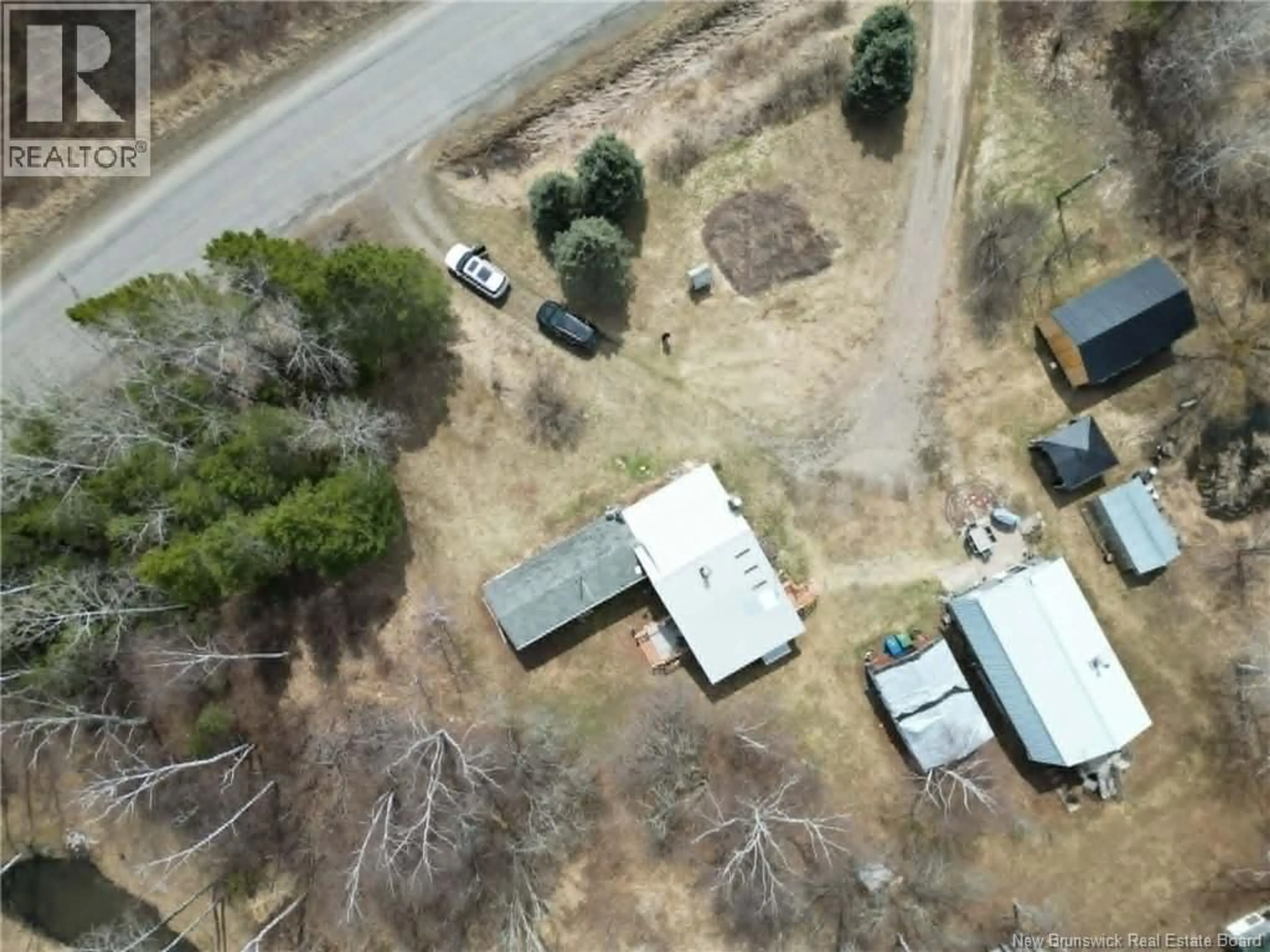 A pic from outside/outdoor area/front of a property/back of a property/a pic from drone, street for 845 ROUTE 385, Burntland Brook New Brunswick E7G3M2