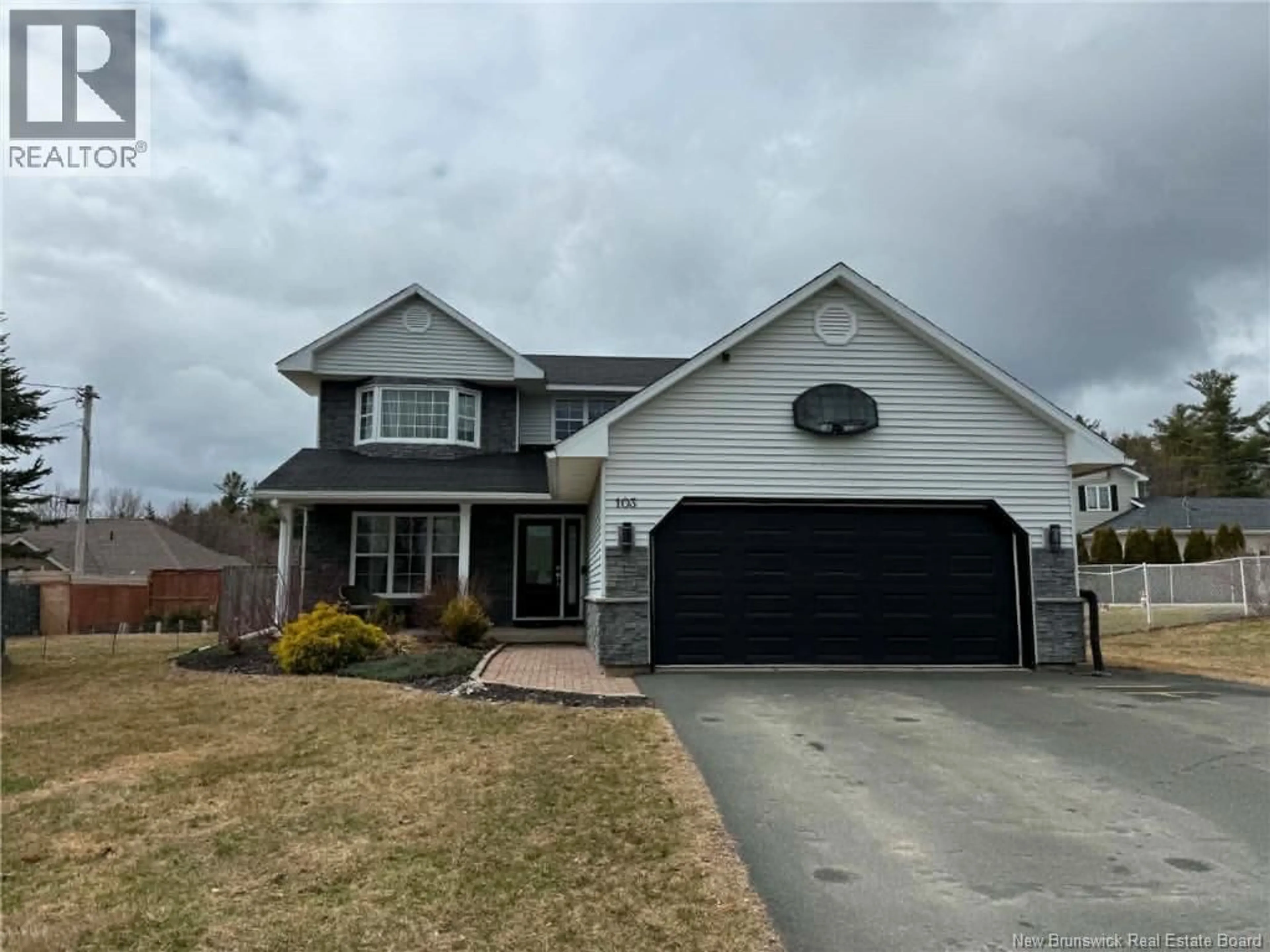 Home with vinyl exterior material, street for 103 WAVERLY DRIVE, Miramichi New Brunswick E1V7R3