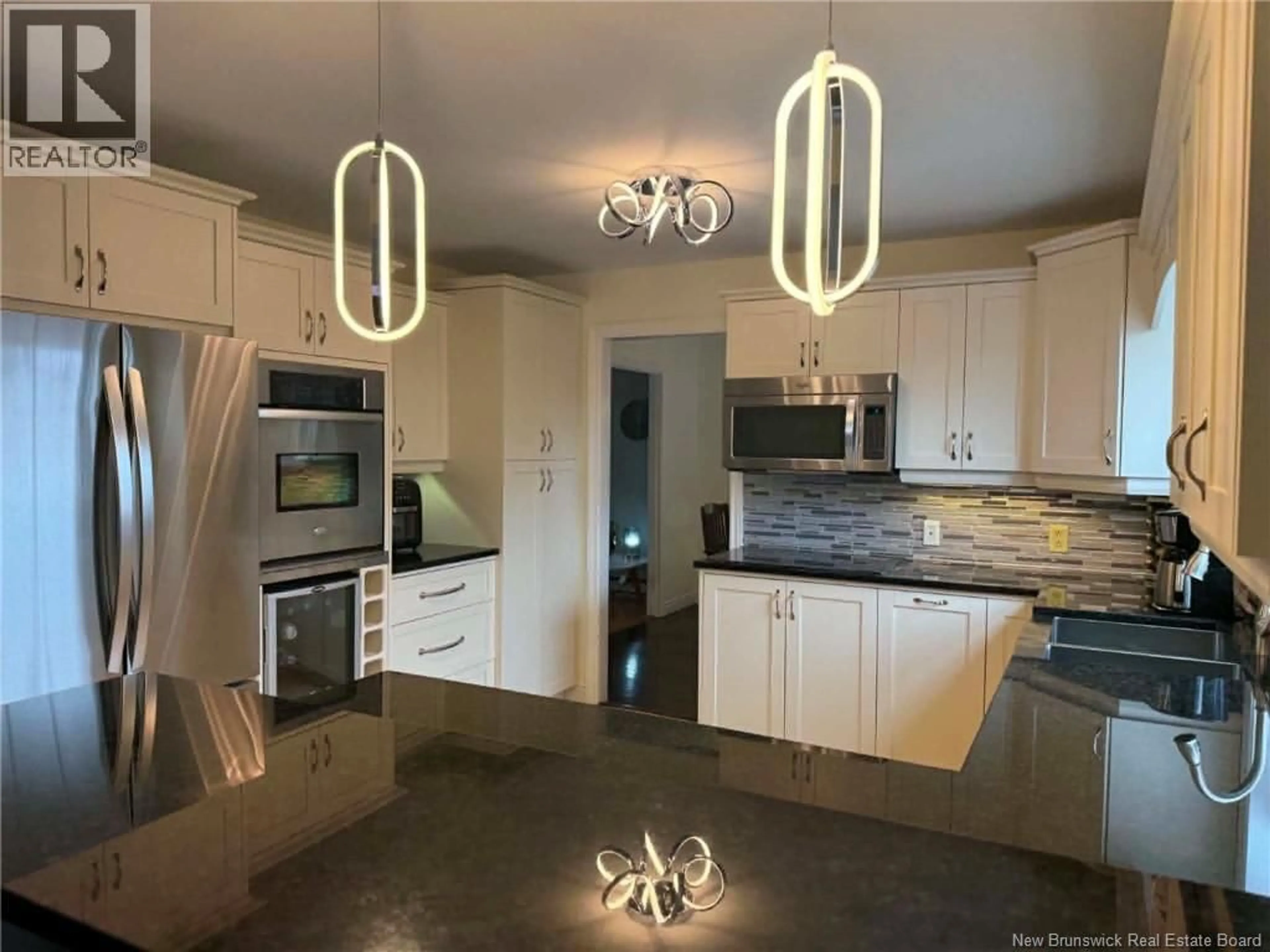 Open concept kitchen, ceramic/tile floor for 103 WAVERLY DRIVE, Miramichi New Brunswick E1V7R3