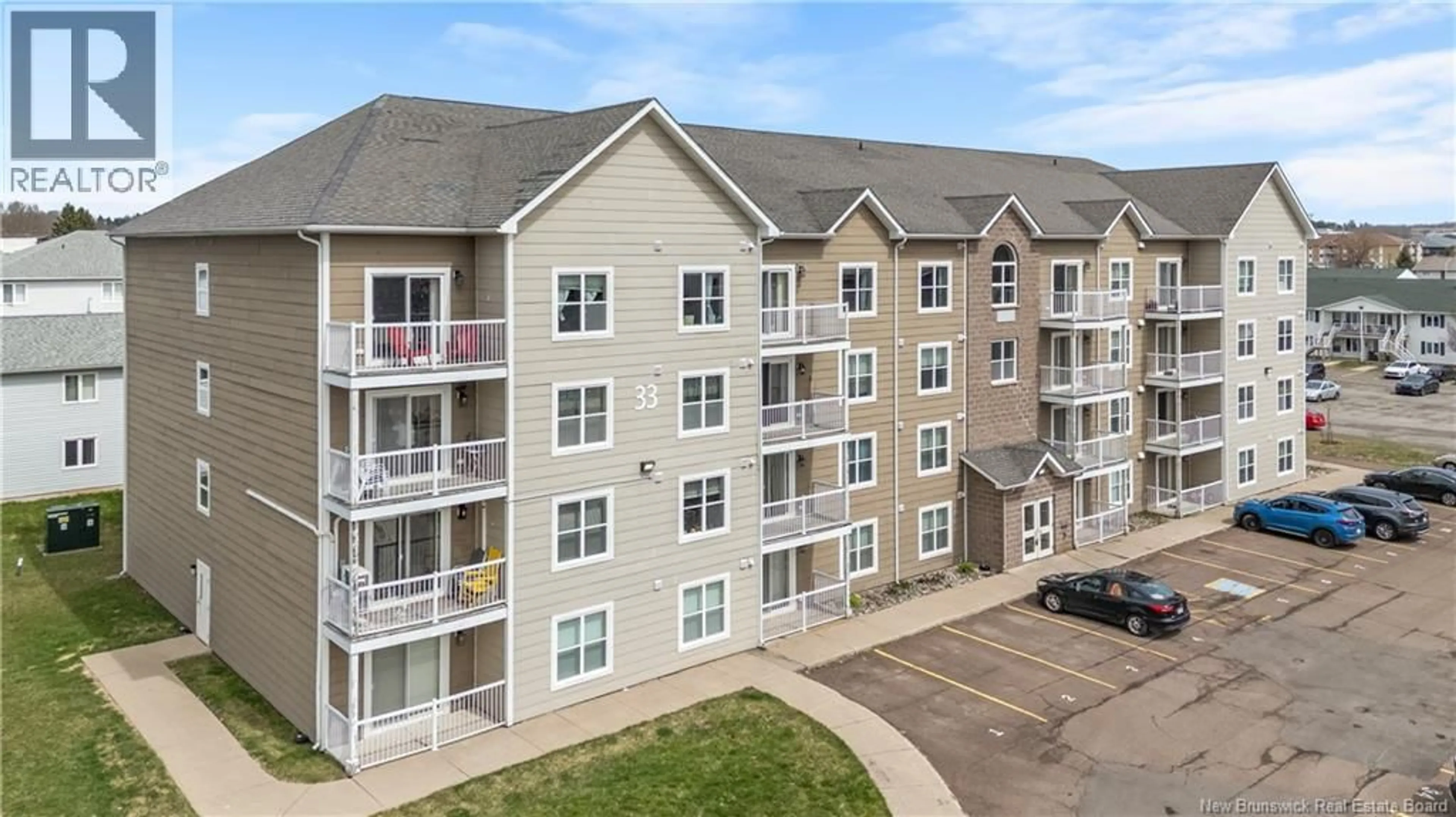 A pic from outside/outdoor area/front of a property/back of a property/a pic from drone, building for 206 - 33 SIFROI STREET, Dieppe New Brunswick E1A1L6