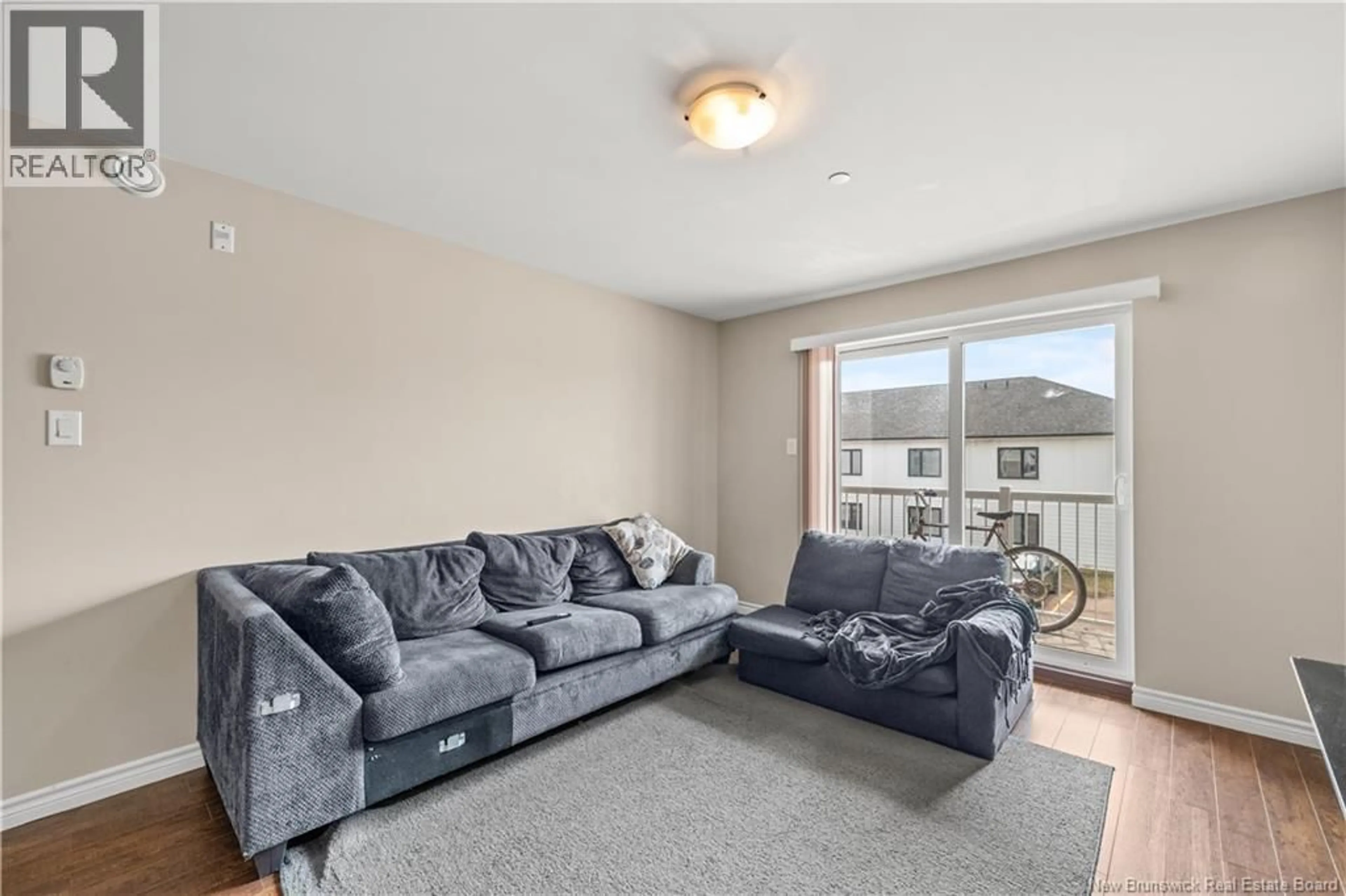 Living room with furniture, unknown for 206 - 33 SIFROI STREET, Dieppe New Brunswick E1A1L6