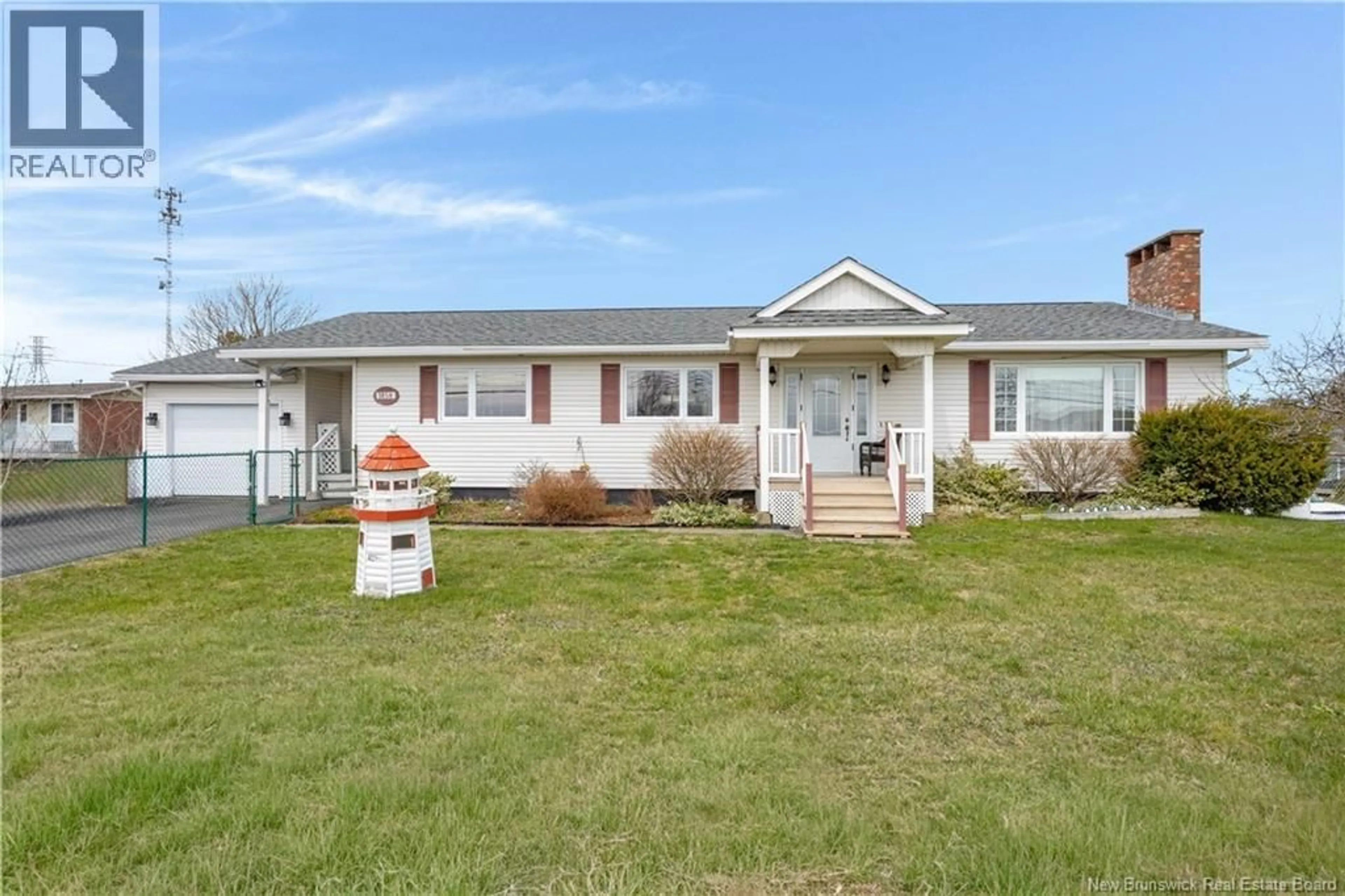 Home with vinyl exterior material, street for 1858 MANAWAGONISH ROAD, Saint John New Brunswick E2M5H5