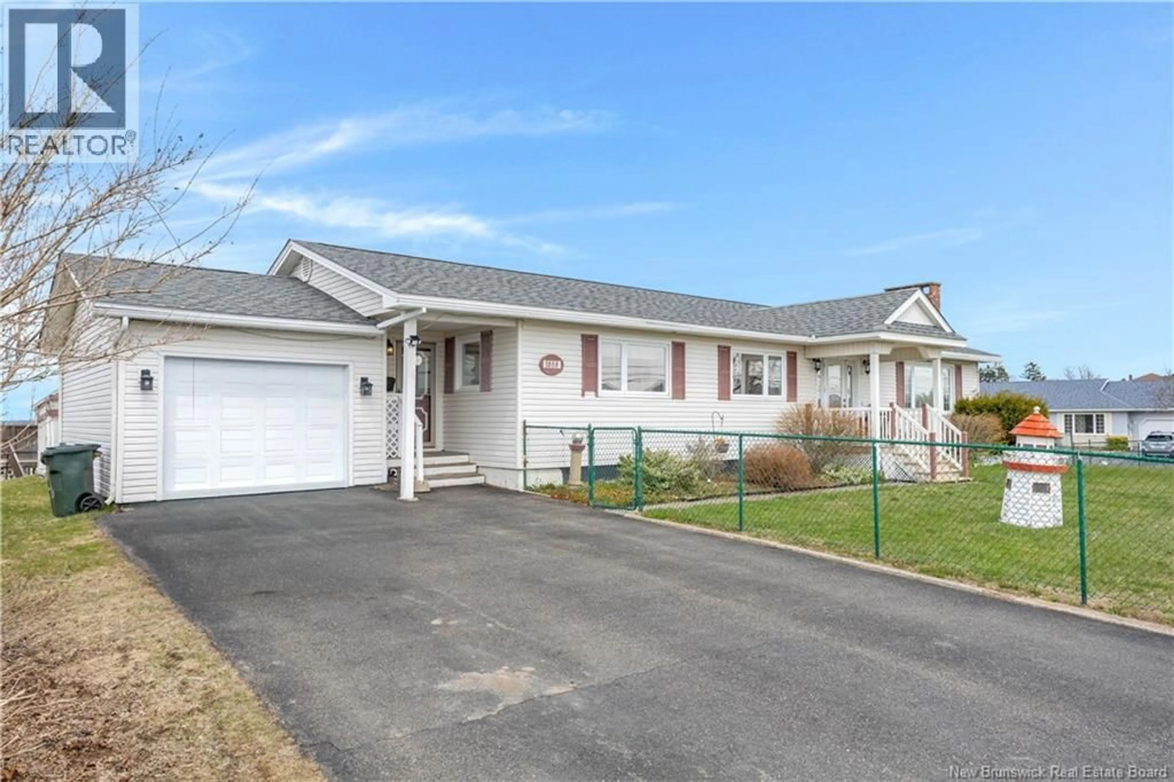 Home with vinyl exterior material, street for 1858 MANAWAGONISH ROAD, Saint John New Brunswick E2M5H5