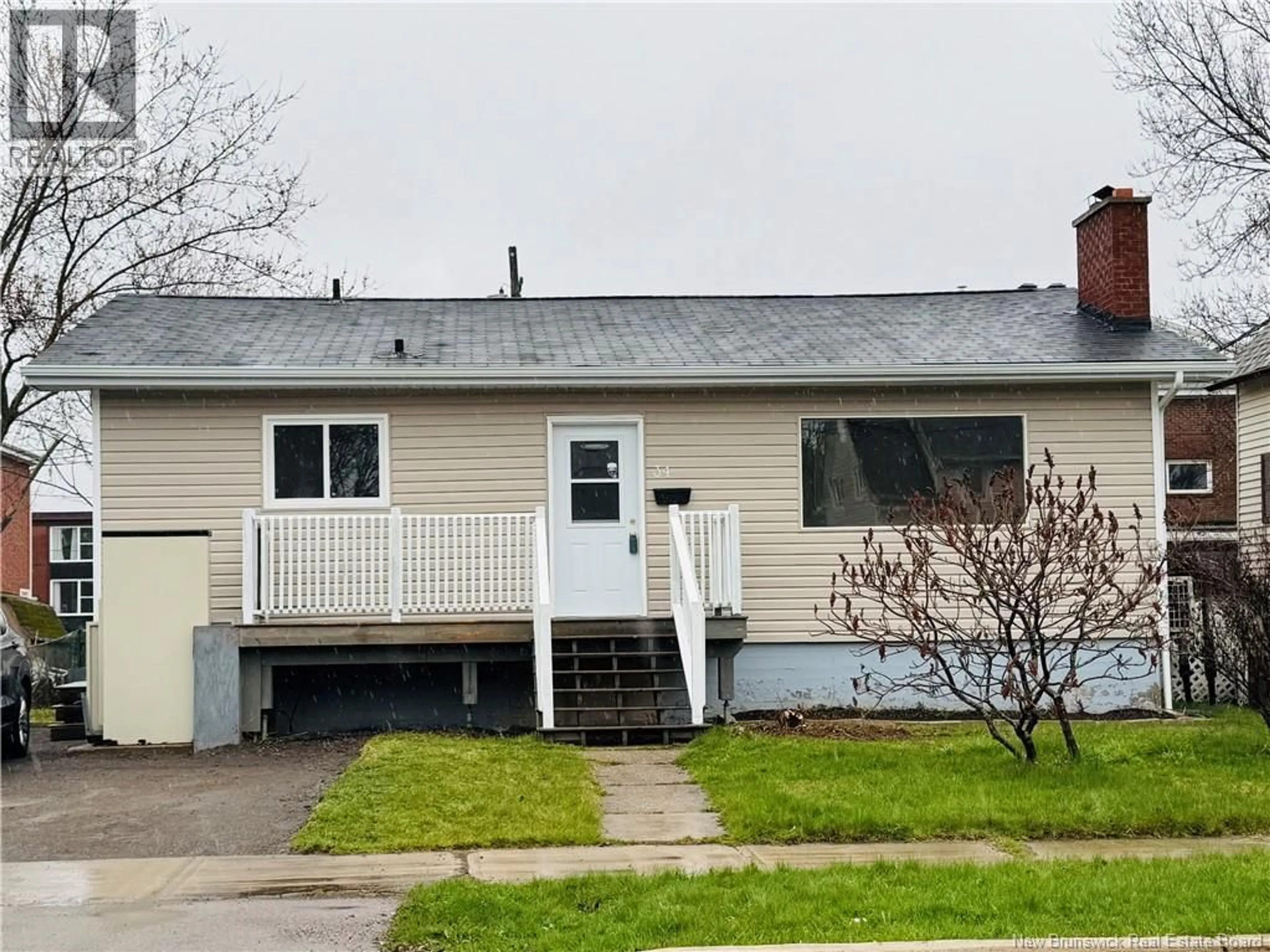 Home with vinyl exterior material, street for 34 ATKINSON AVENUE, Moncton New Brunswick E1C7S3