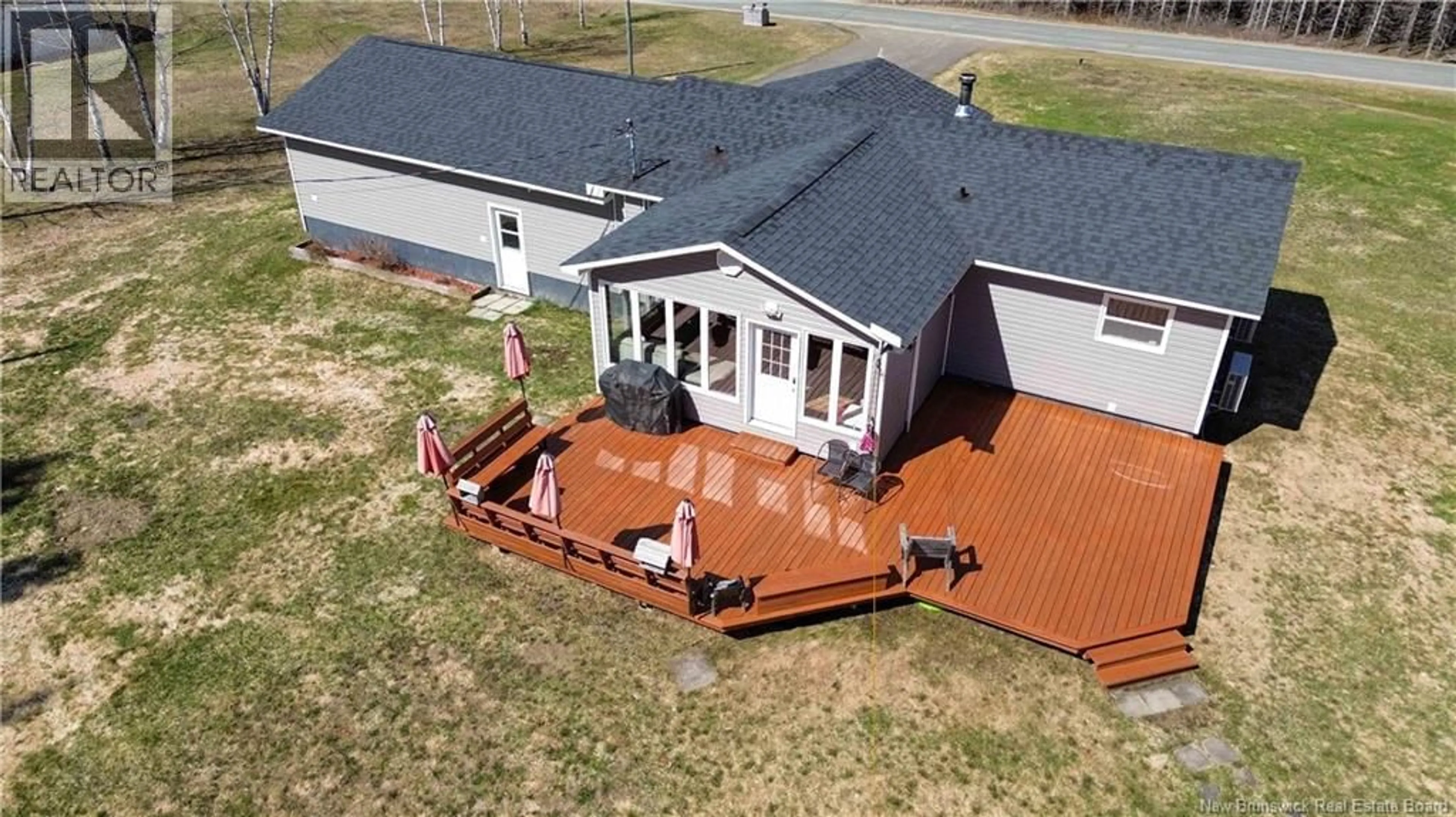 A pic from outside/outdoor area/front of a property/back of a property/a pic from drone, unknown for 1122 580 ROUTE, Glassville New Brunswick E7L1P8
