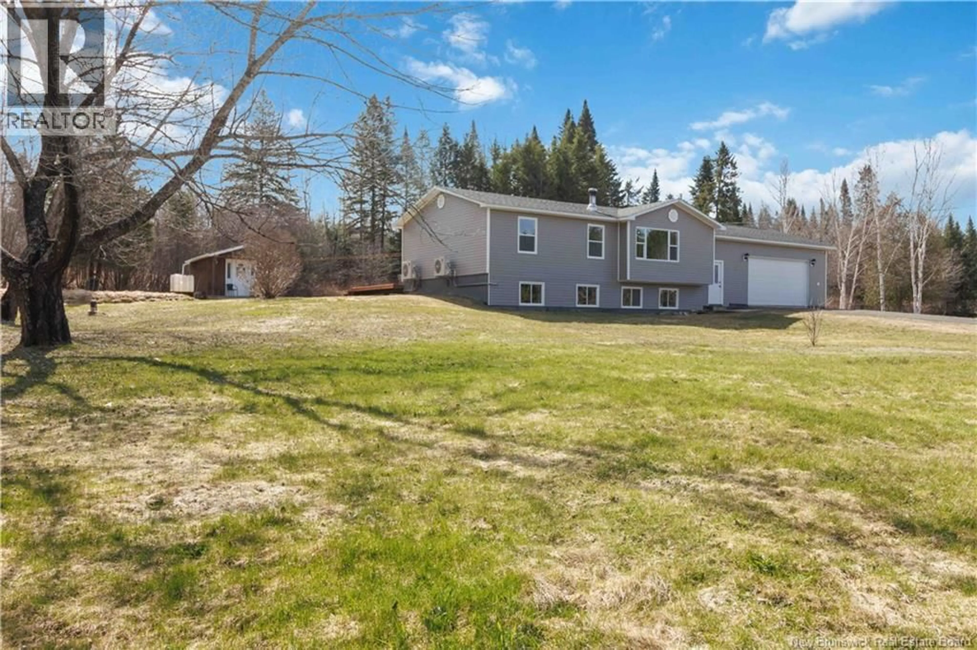 A pic from outside/outdoor area/front of a property/back of a property/a pic from drone, unknown for 1122 580 ROUTE, Glassville New Brunswick E7L1P8