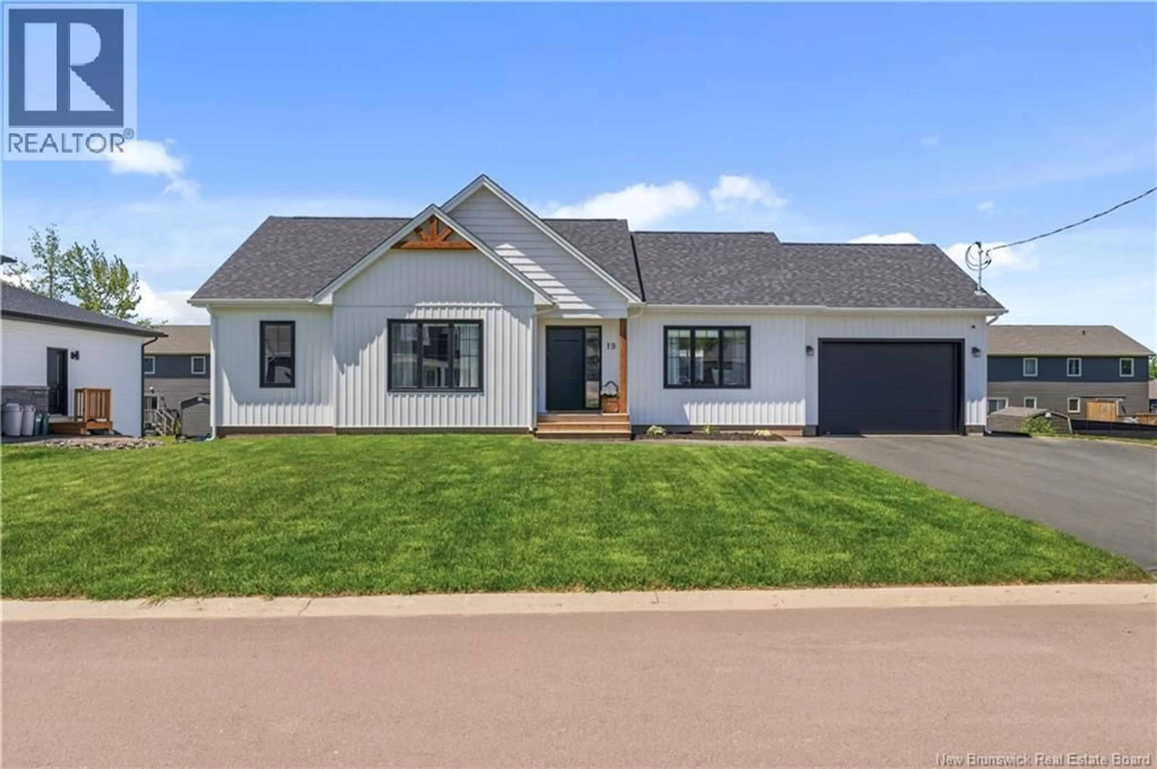 Home with vinyl exterior material, street for 19 LE GUERNE COURT, Moncton New Brunswick E1K0A3