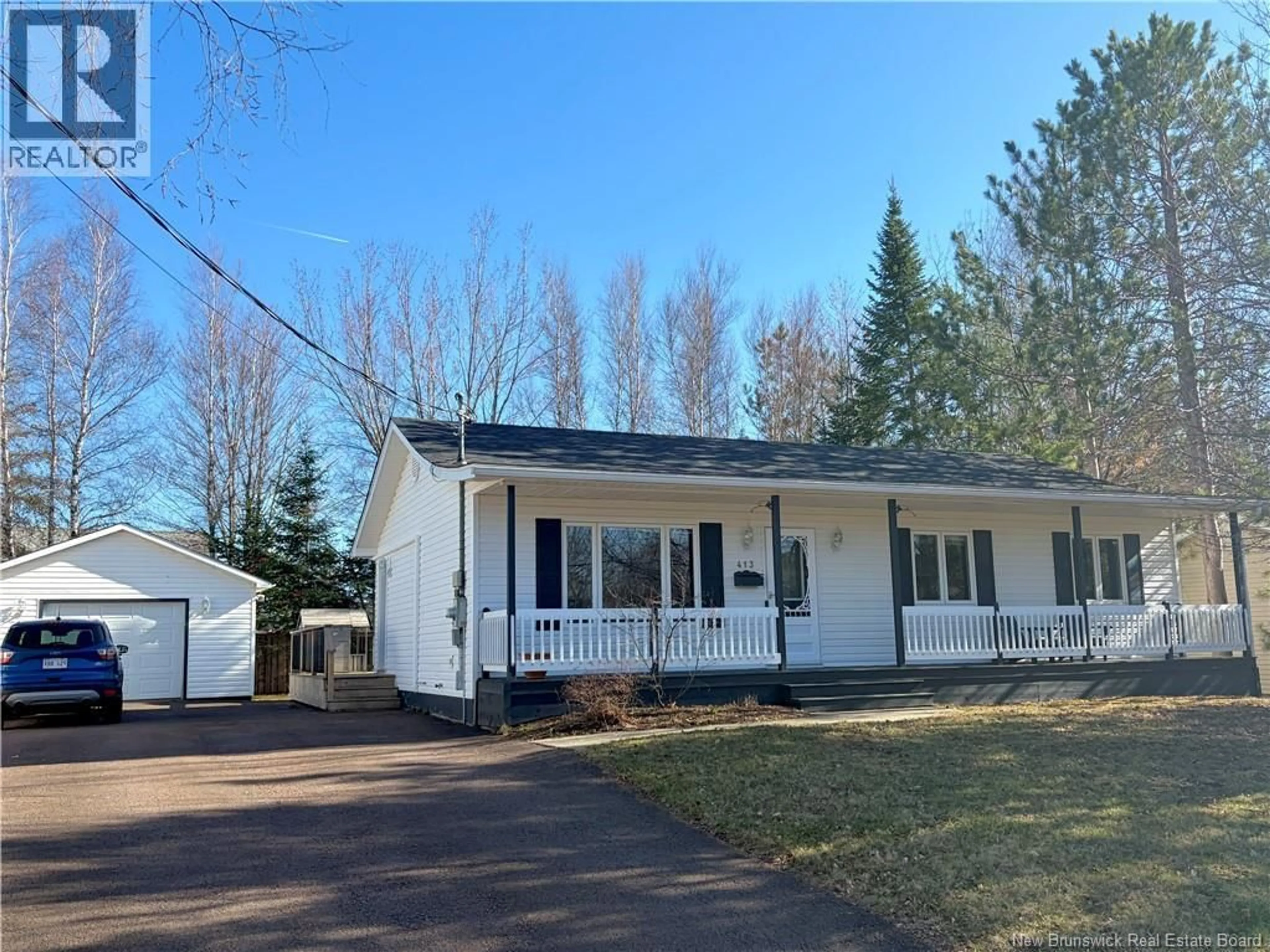 Home with vinyl exterior material, street for 413 MANDEVILLE STREET, Dieppe New Brunswick E1A6W1