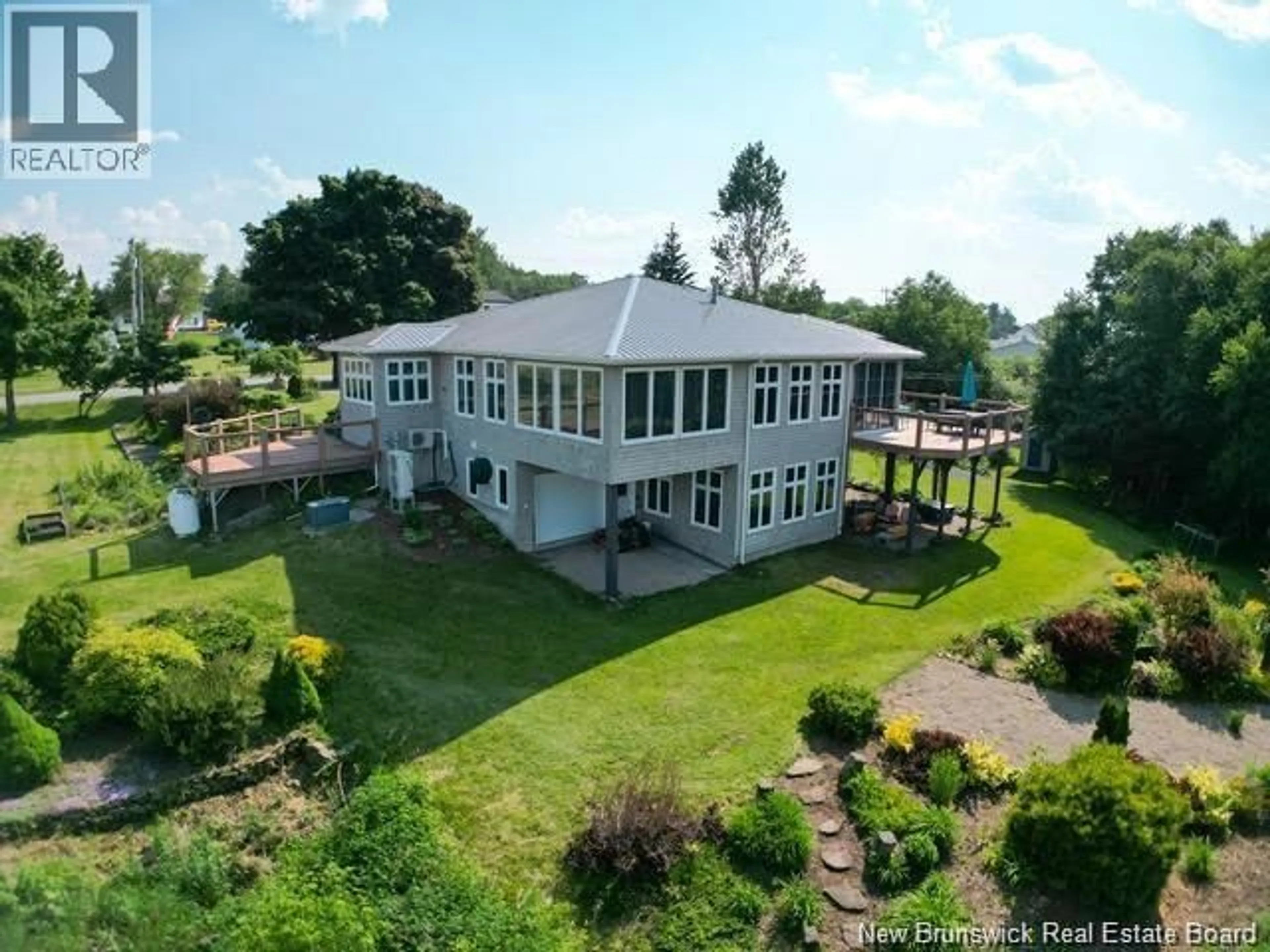 A pic from outside/outdoor area/front of a property/back of a property/a pic from drone, building for 4361 WATER STREET, Miramichi New Brunswick E1N4M1