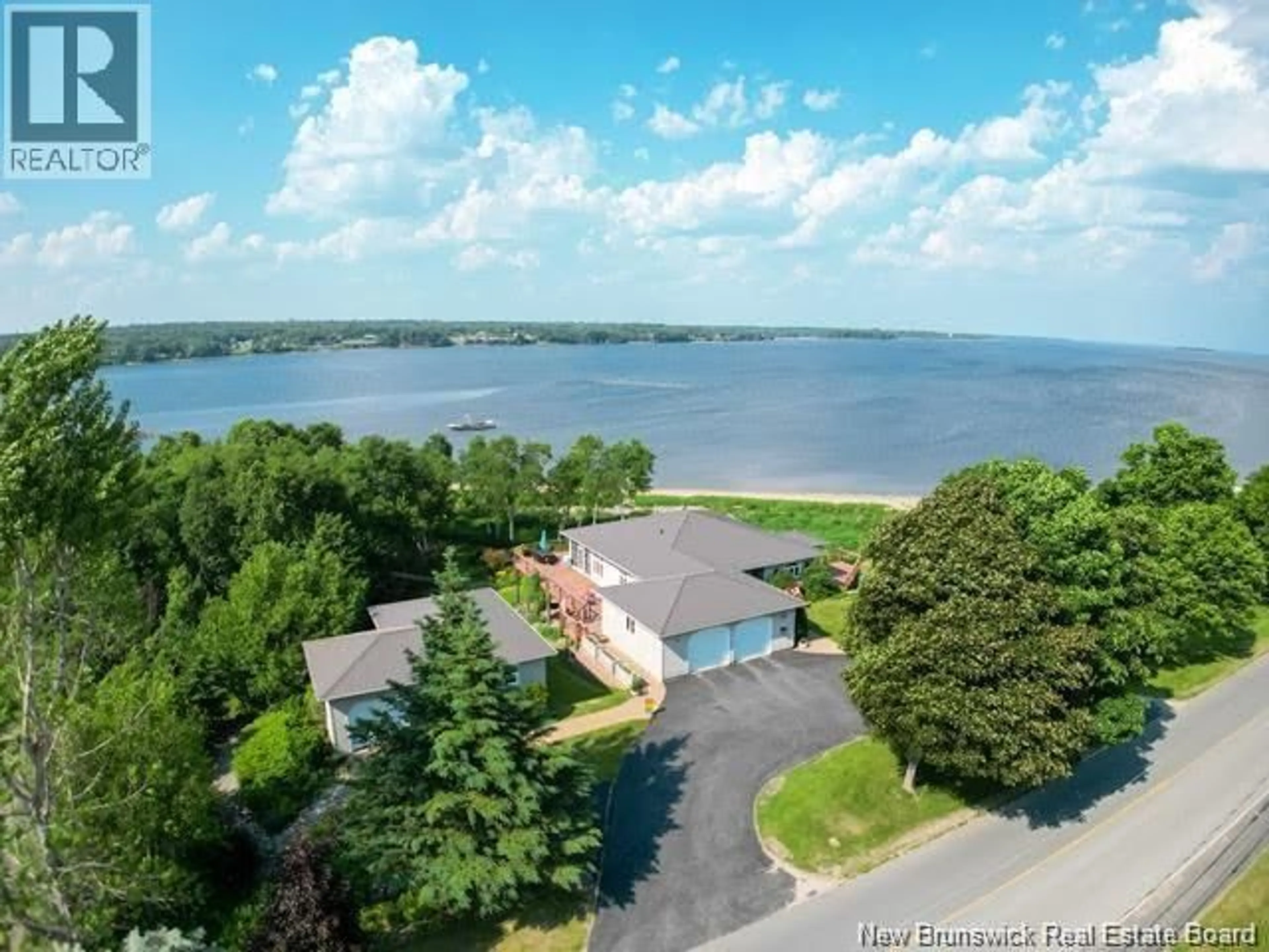 A pic from outside/outdoor area/front of a property/back of a property/a pic from drone, water/lake/river/ocean view for 4361 WATER STREET, Miramichi New Brunswick E1N4M1