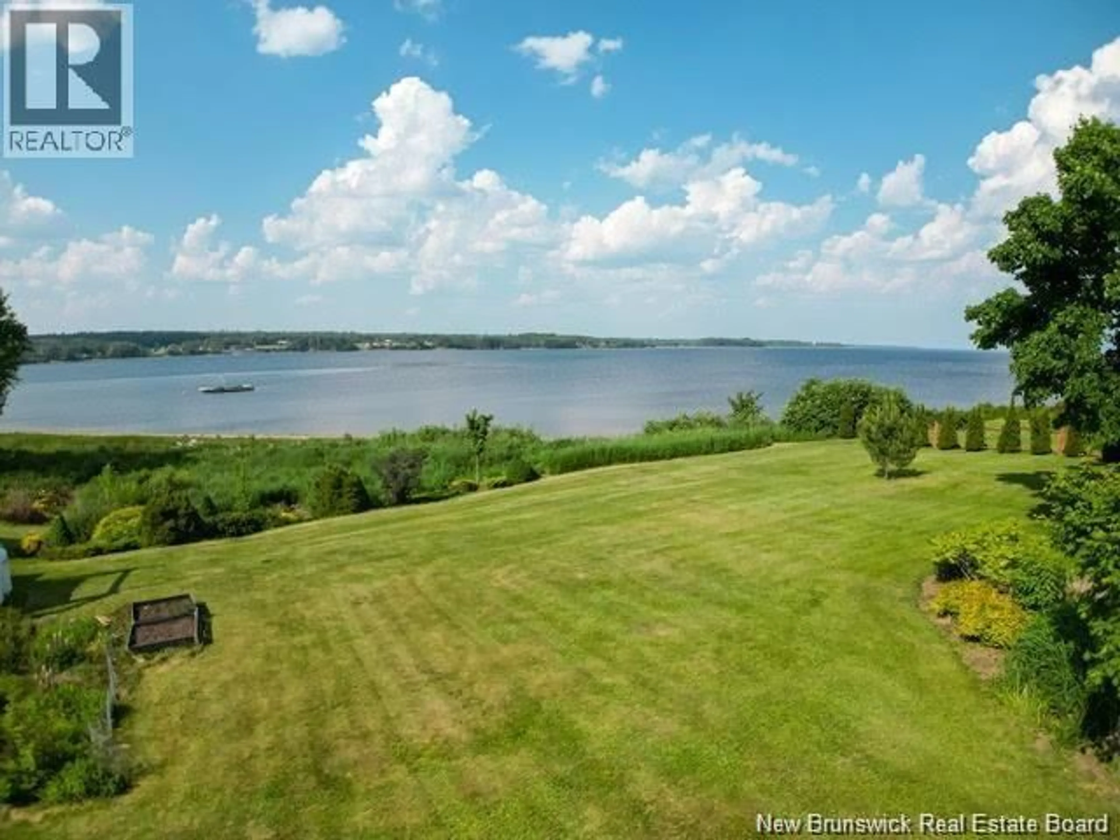 A pic from outside/outdoor area/front of a property/back of a property/a pic from drone, water/lake/river/ocean view for 4361 WATER STREET, Miramichi New Brunswick E1N4M1
