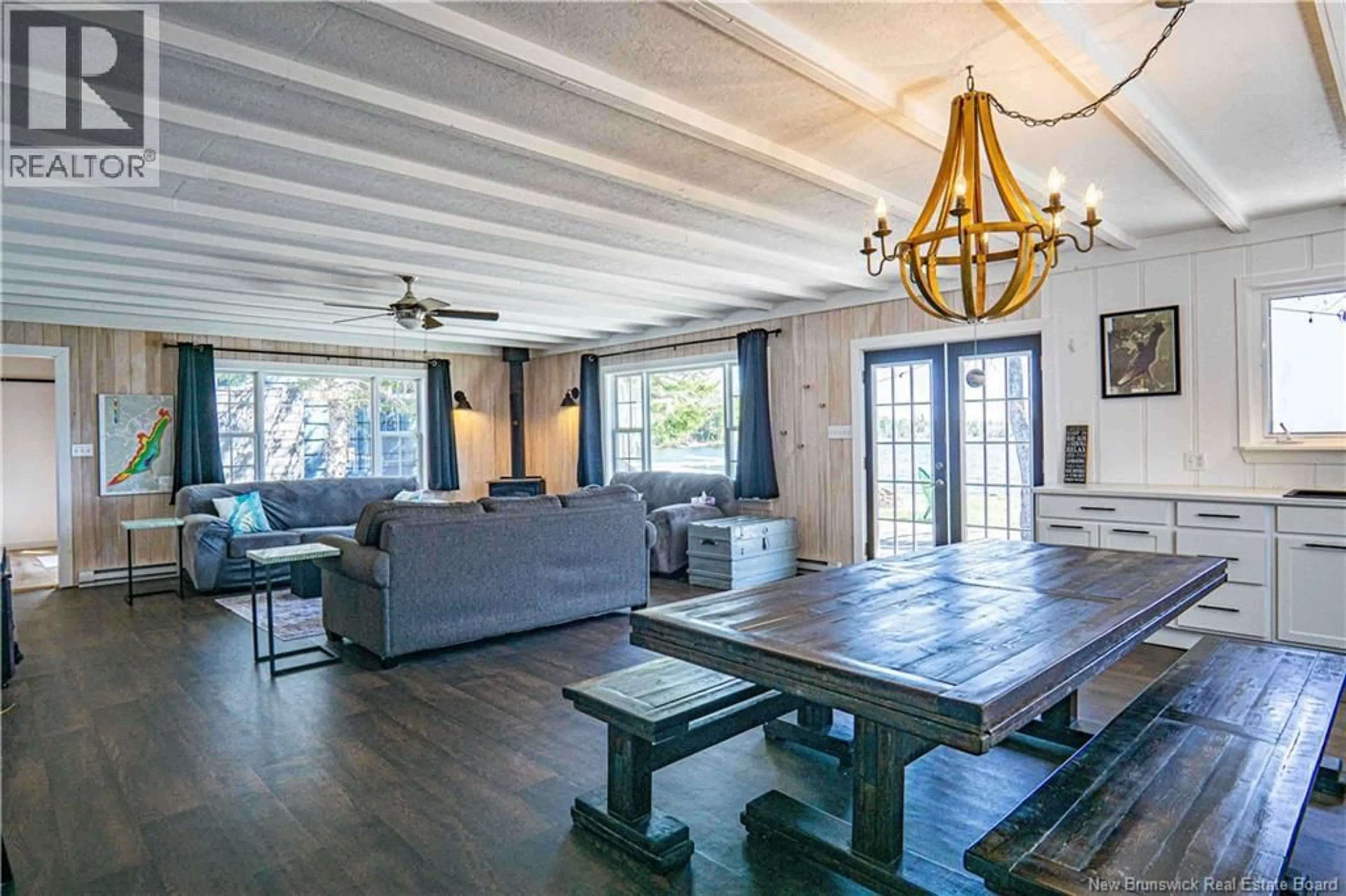 Living room with furniture, wood/laminate floor for 179 JERRY CHESSIE ROAD, Hanwell New Brunswick E2V0A6