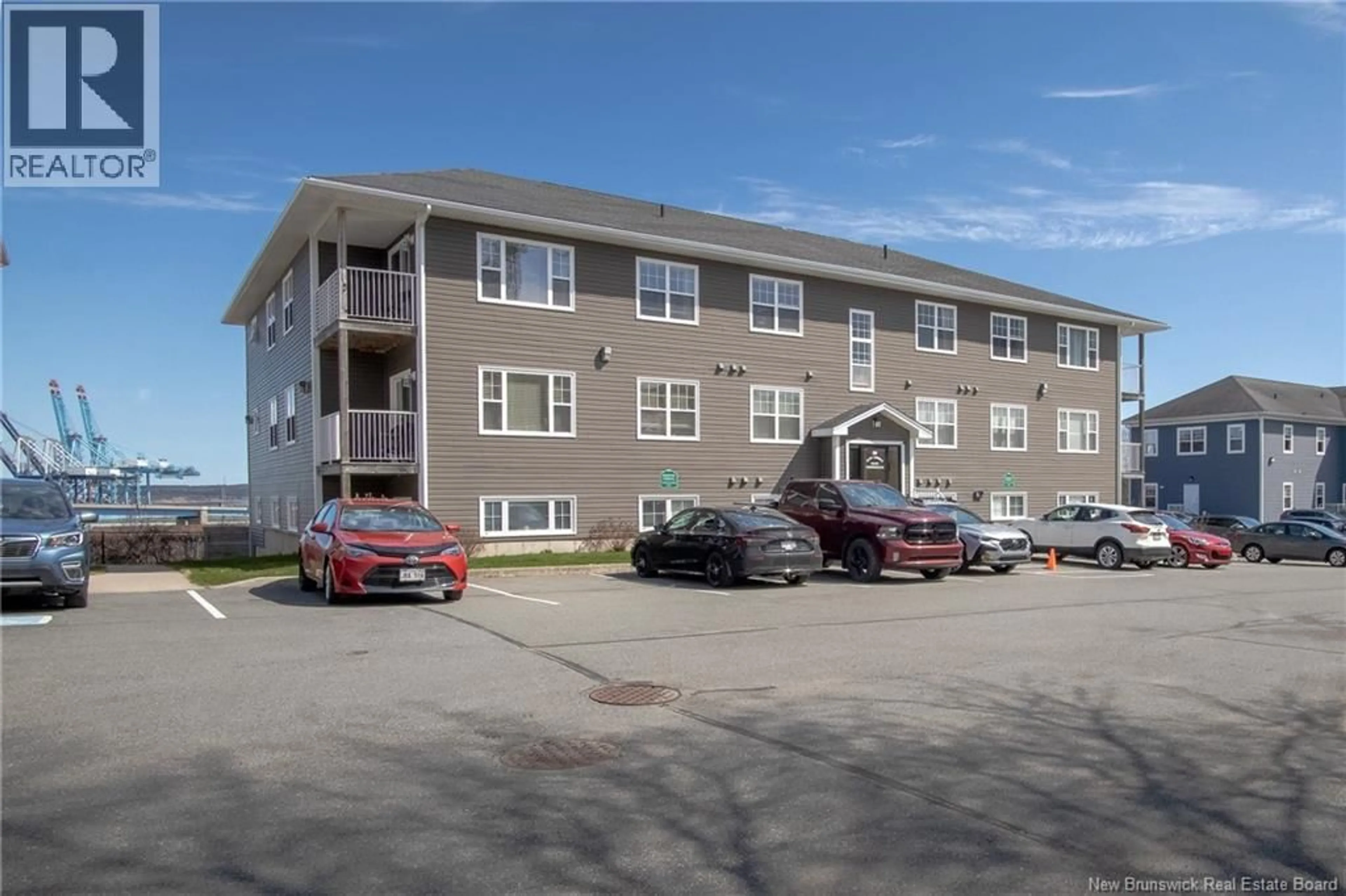 A pic from outside/outdoor area/front of a property/back of a property/a pic from drone, building for 302 - 20 KING GEORGE COURT, Saint John New Brunswick E2K1B2