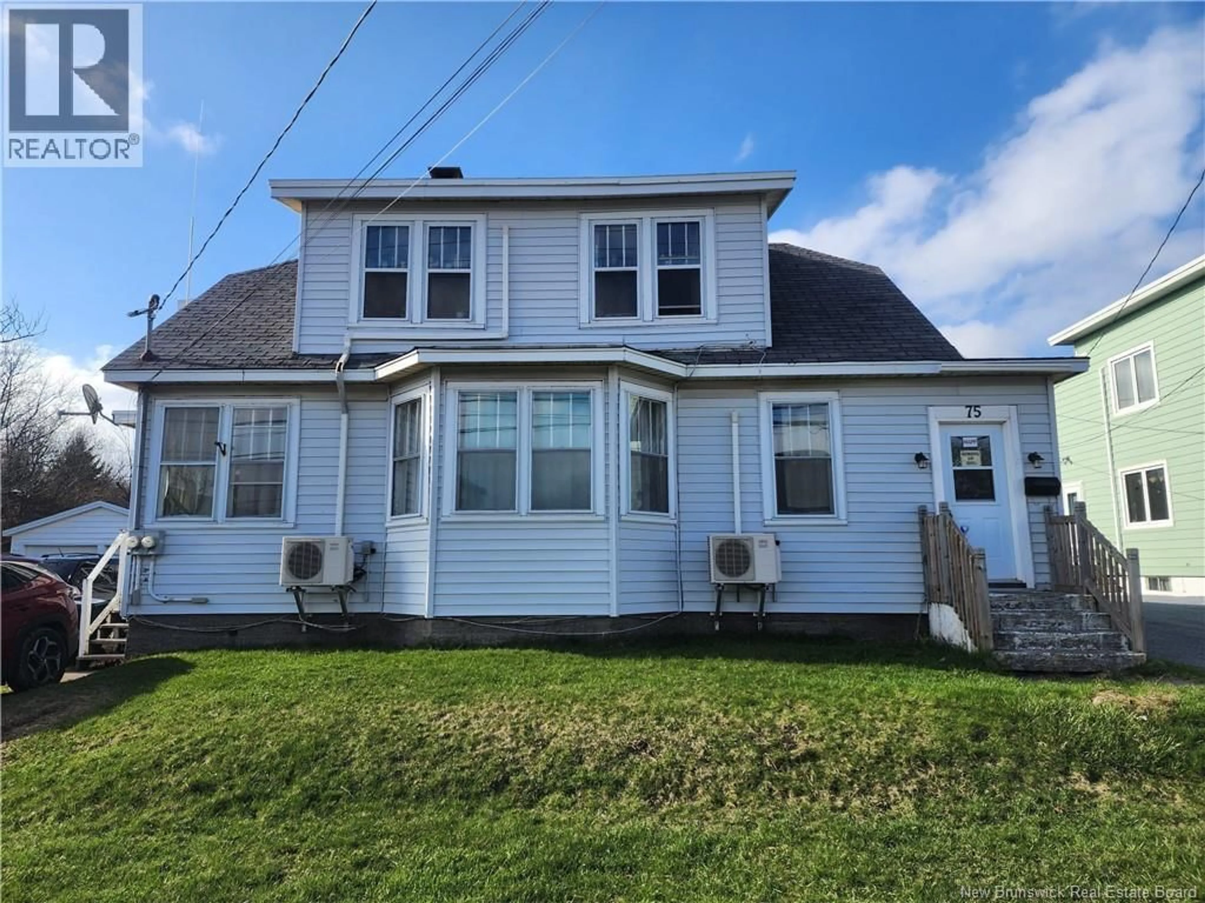 Home with vinyl exterior material, street for 73-75 LOCH LOMOND, Saint John New Brunswick E2J1X6