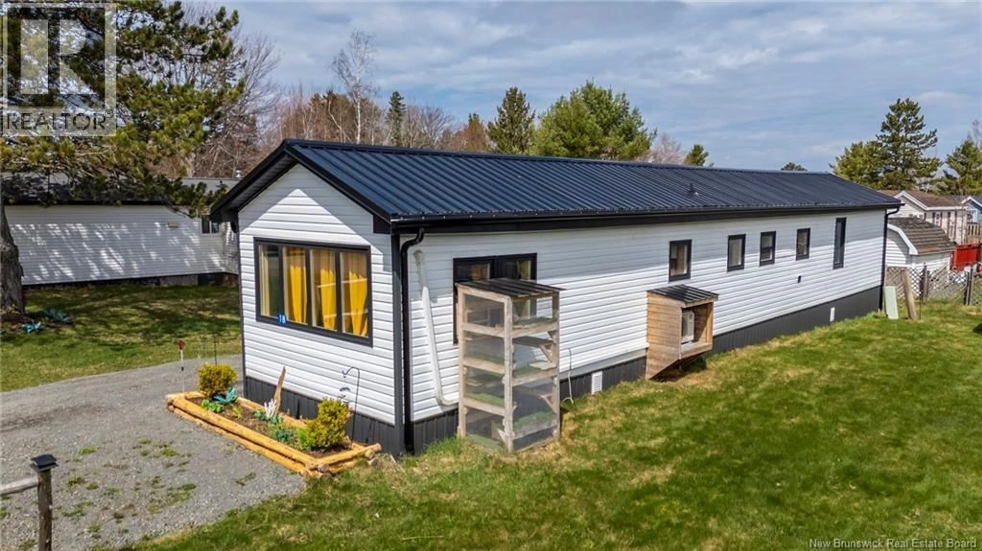 Home with vinyl exterior material, building for 18 DAISY LANE, Riverview New Brunswick E1B4Z3