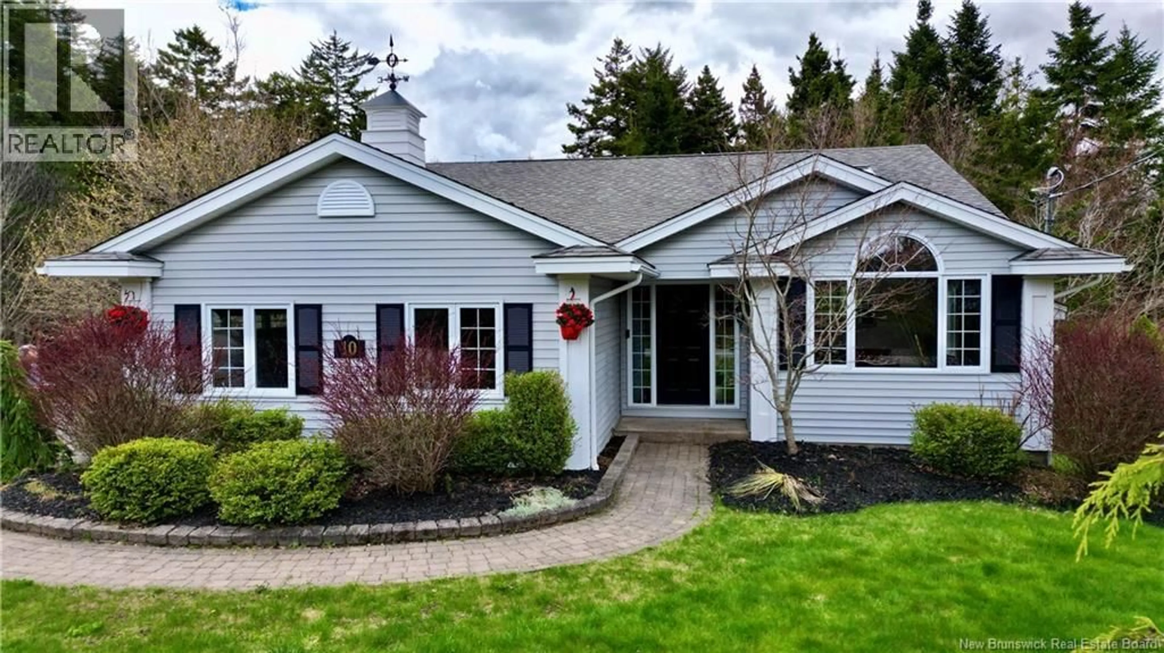 Home with vinyl exterior material, street for 10 COLCHESTER DRIVE, Quispamsis New Brunswick E2E5C5