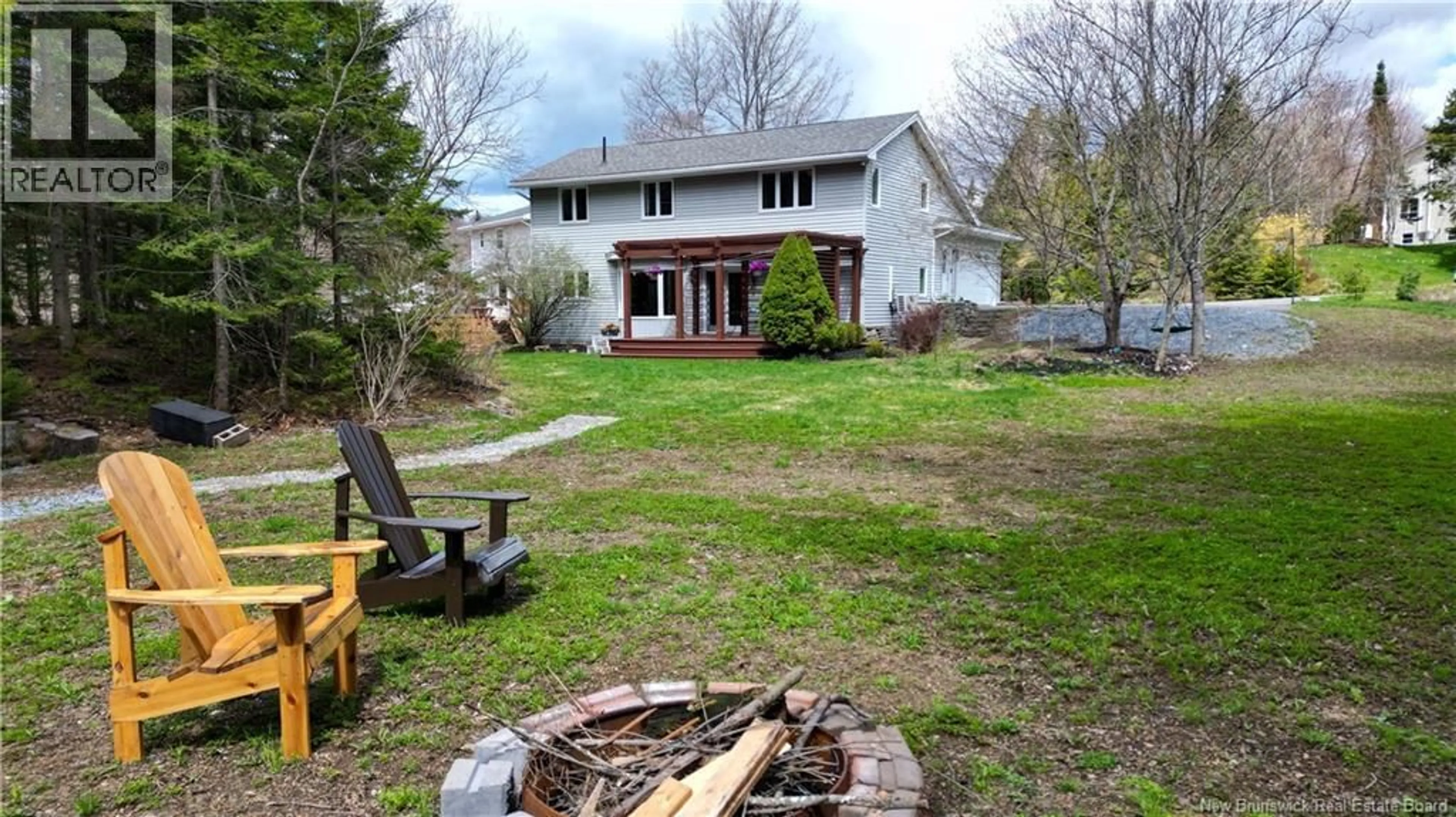 A pic from outside/outdoor area/front of a property/back of a property/a pic from drone, unknown for 10 COLCHESTER DRIVE, Quispamsis New Brunswick E2E5C5