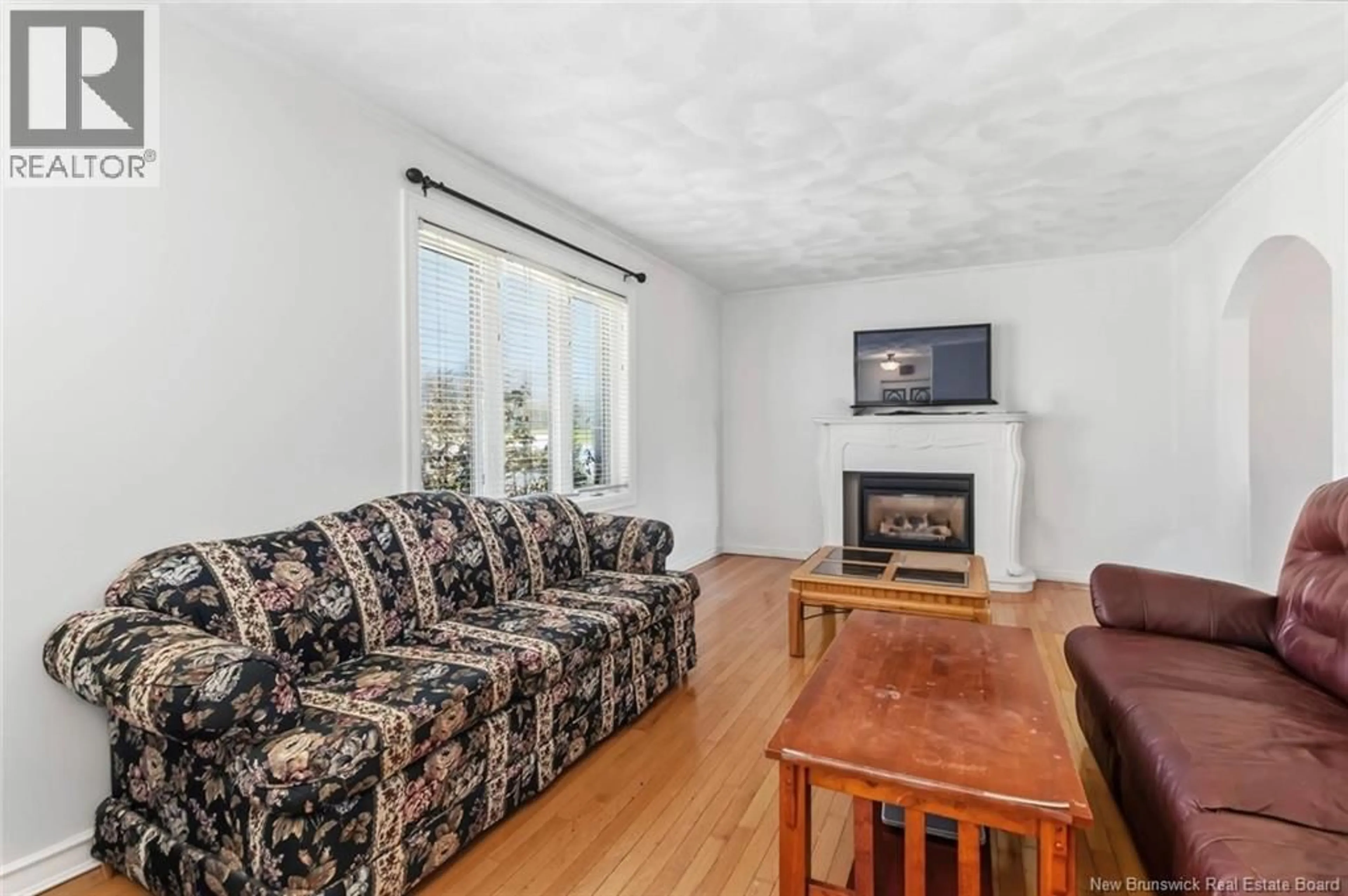 Living room with furniture, unknown for 27 WOODSTONE CRESCENT, Moncton New Brunswick E1G1W3