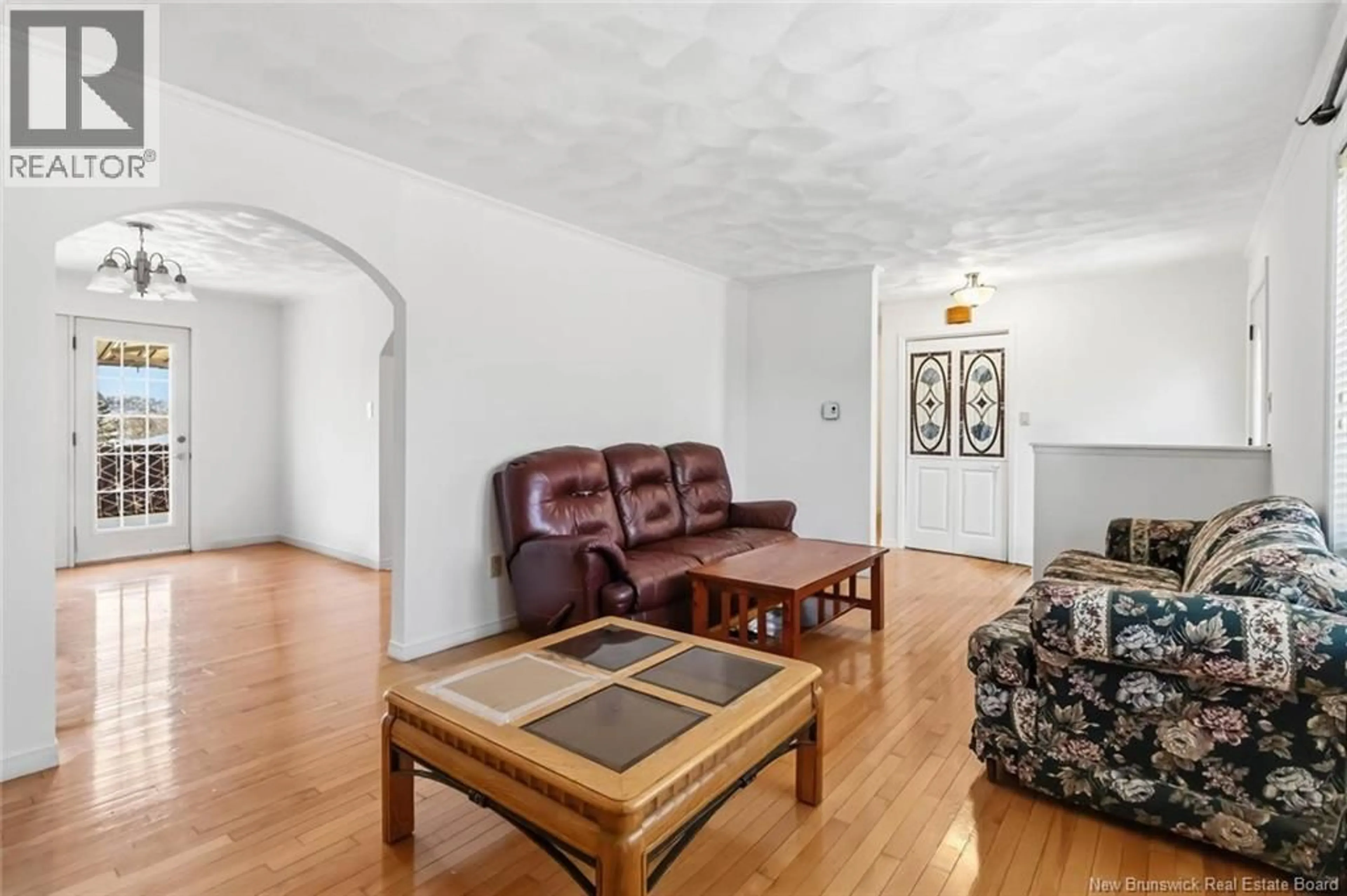 Living room with furniture, unknown for 27 WOODSTONE CRESCENT, Moncton New Brunswick E1G1W3