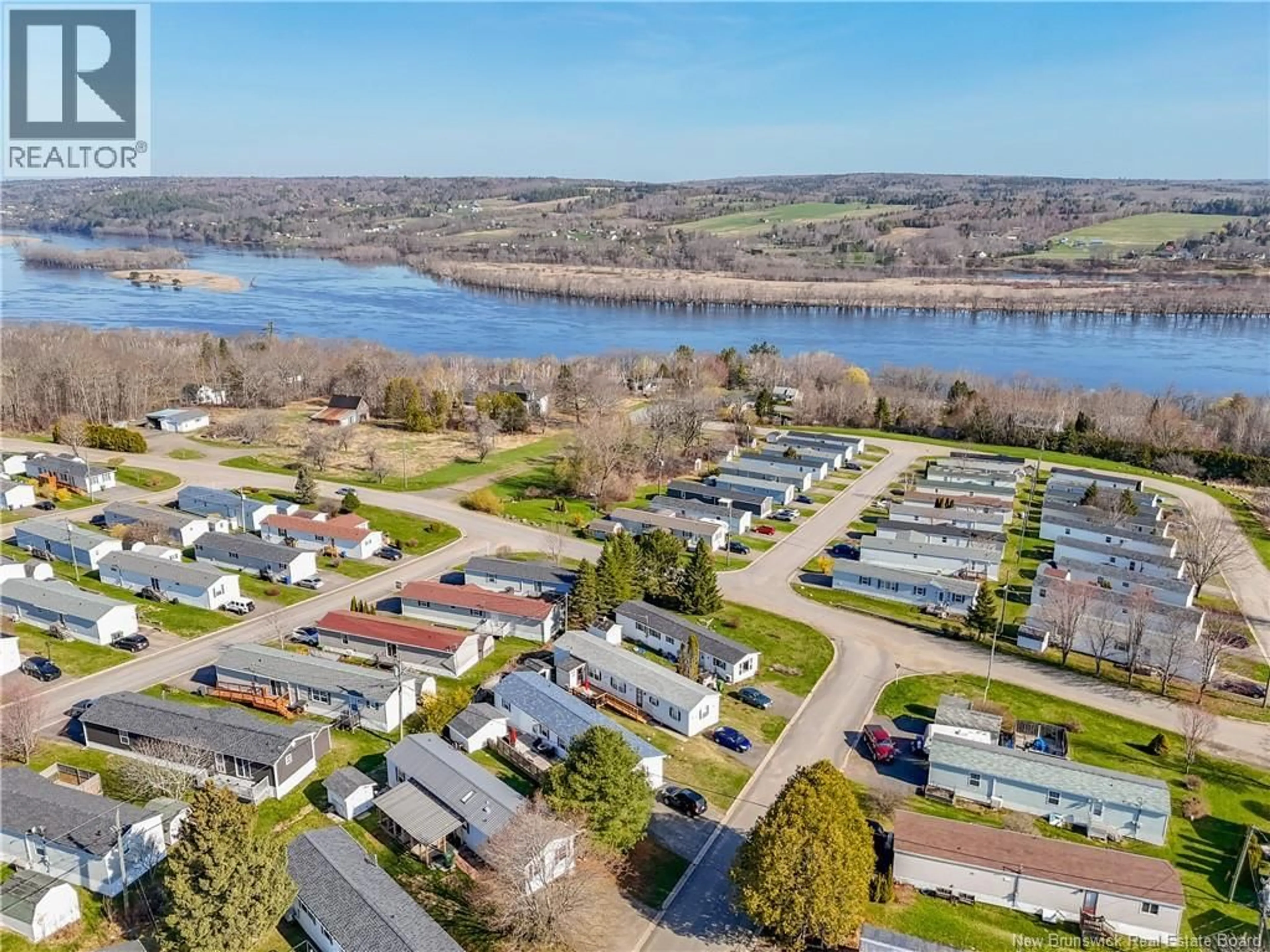 A pic from outside/outdoor area/front of a property/back of a property/a pic from drone, water/lake/river/ocean view for 41 BAYBERRY STREET, Fredericton New Brunswick E3C1L8
