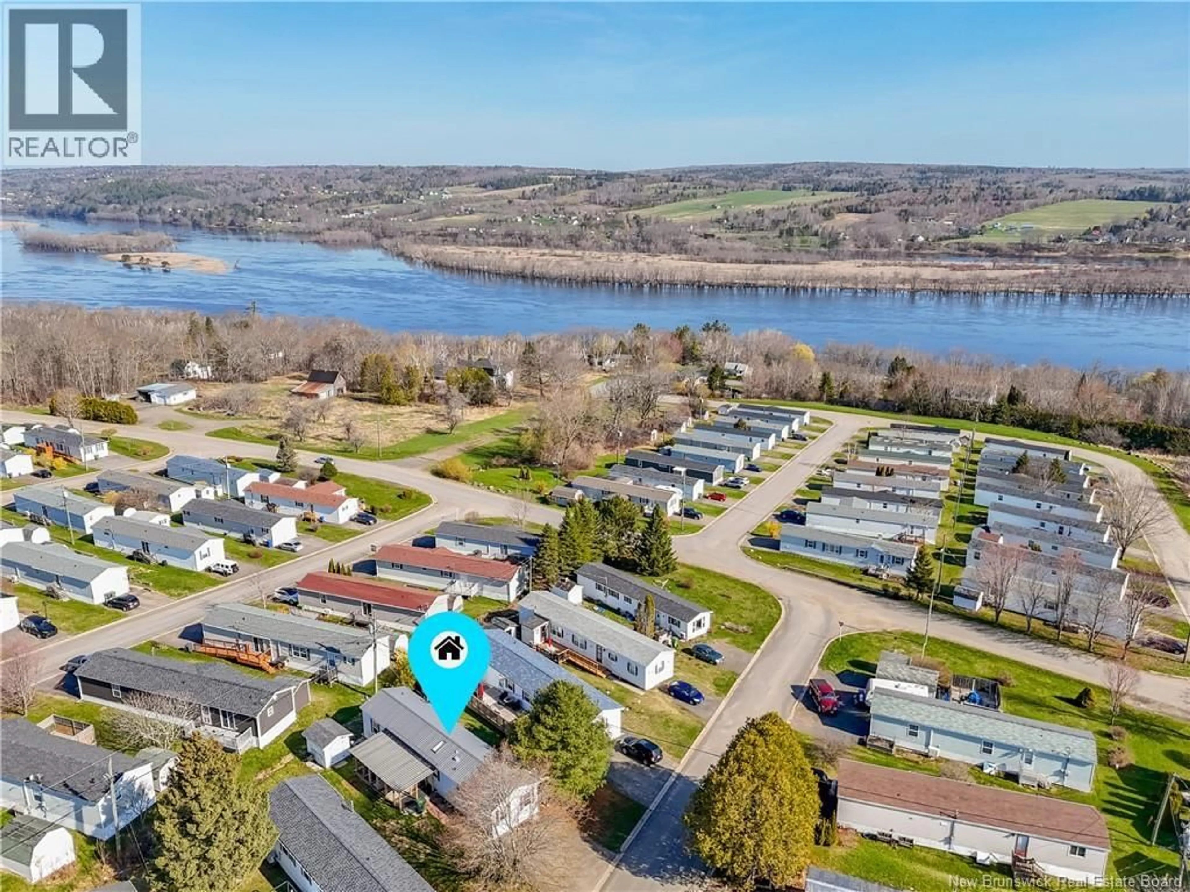 A pic from outside/outdoor area/front of a property/back of a property/a pic from drone, water/lake/river/ocean view for 41 BAYBERRY STREET, Fredericton New Brunswick E3C1L8