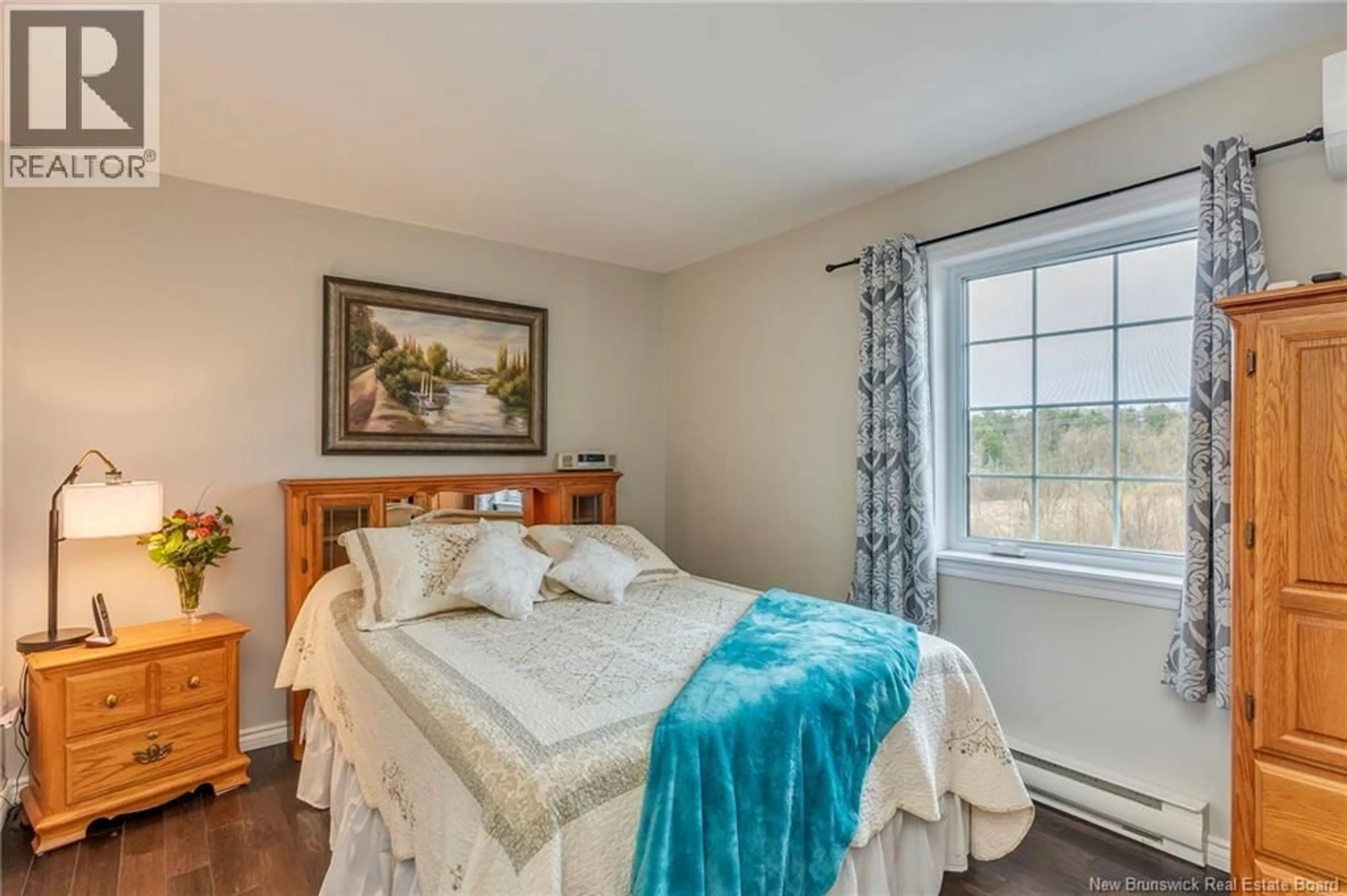 Bedroom with bed, wood/laminate floor for 14 HONEYSUCKLE DRIVE, Saint John New Brunswick E2M5X4