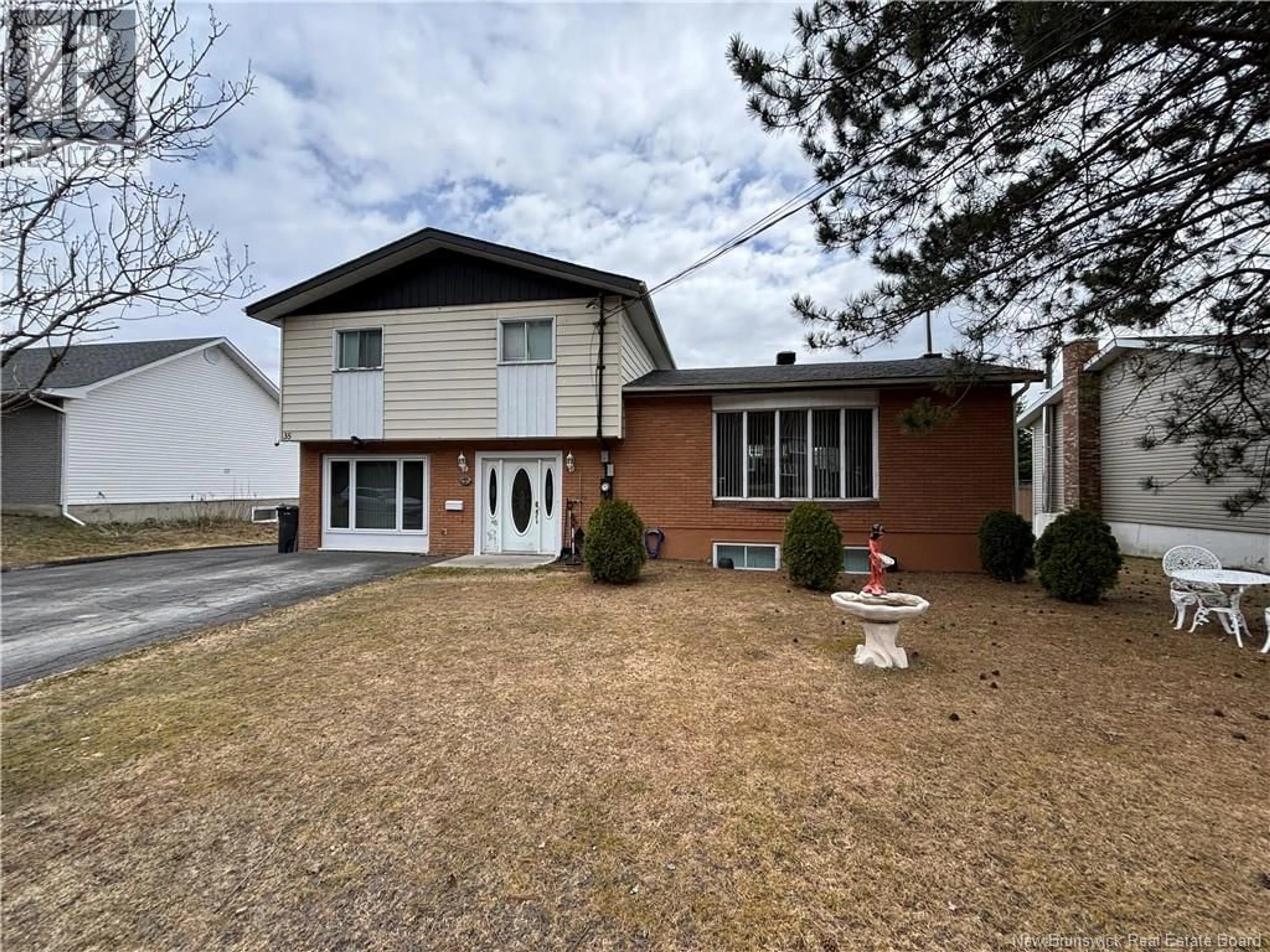 Home with brick exterior material, street for 35 JEAN-BÉLANGER, Edmundston New Brunswick E3V3X5