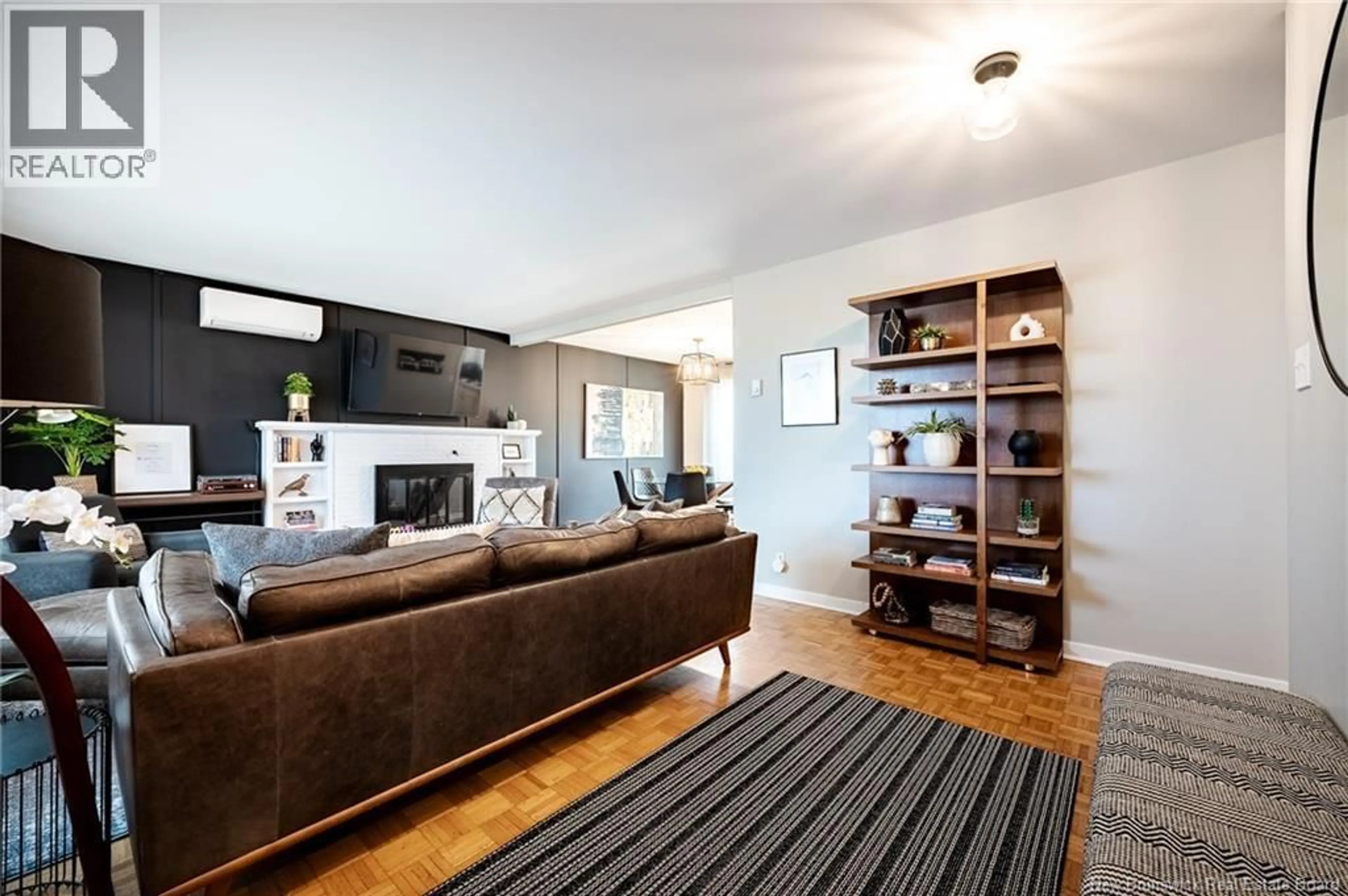 Living room with furniture, wood/laminate floor for 452 PEDERSON CRESCENT, Fredericton New Brunswick E3B2Z2