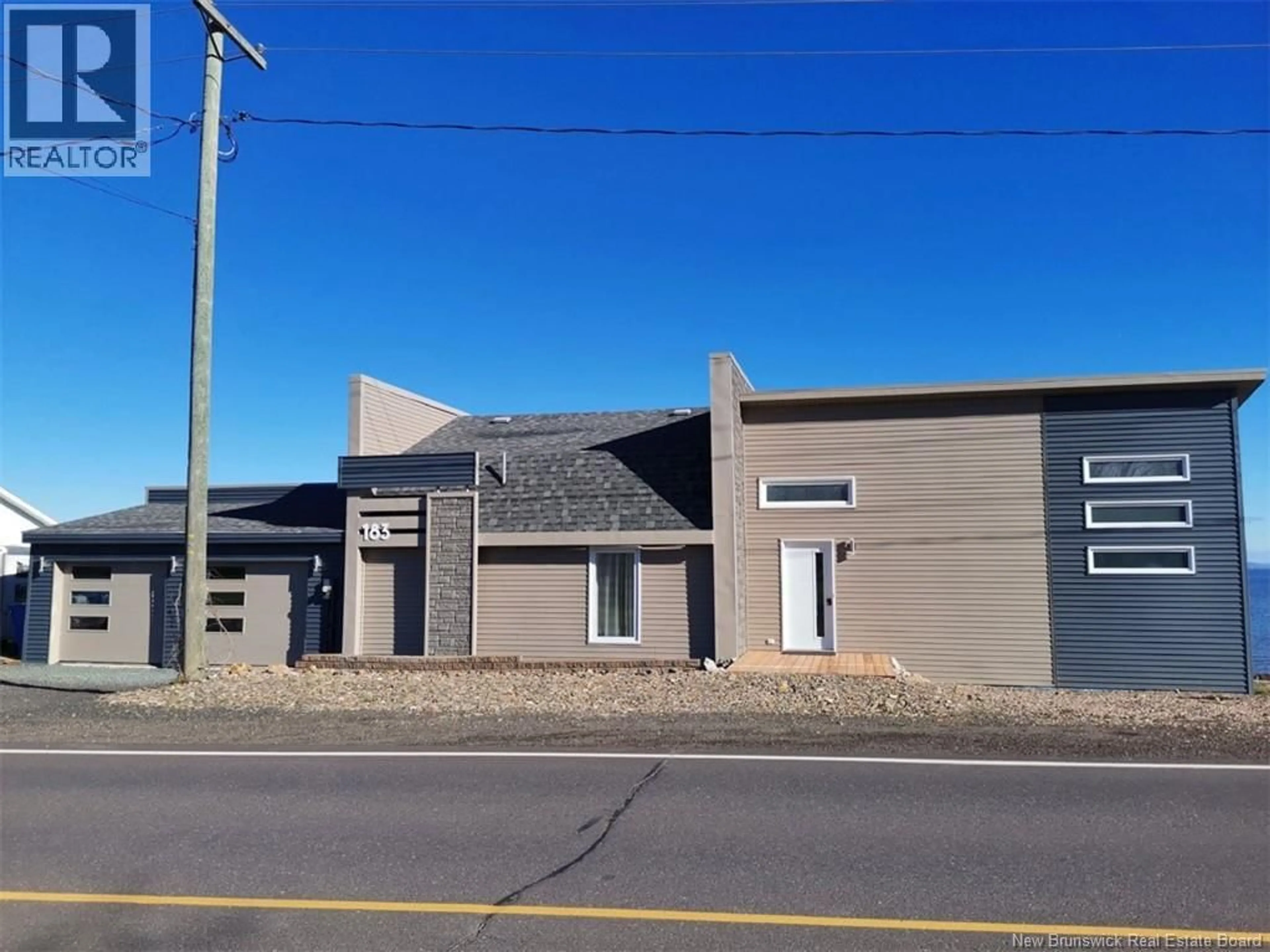 A pic from outside/outdoor area/front of a property/back of a property/a pic from drone, building for 183 CHALEUR STREET, Charlo New Brunswick E8E2B7