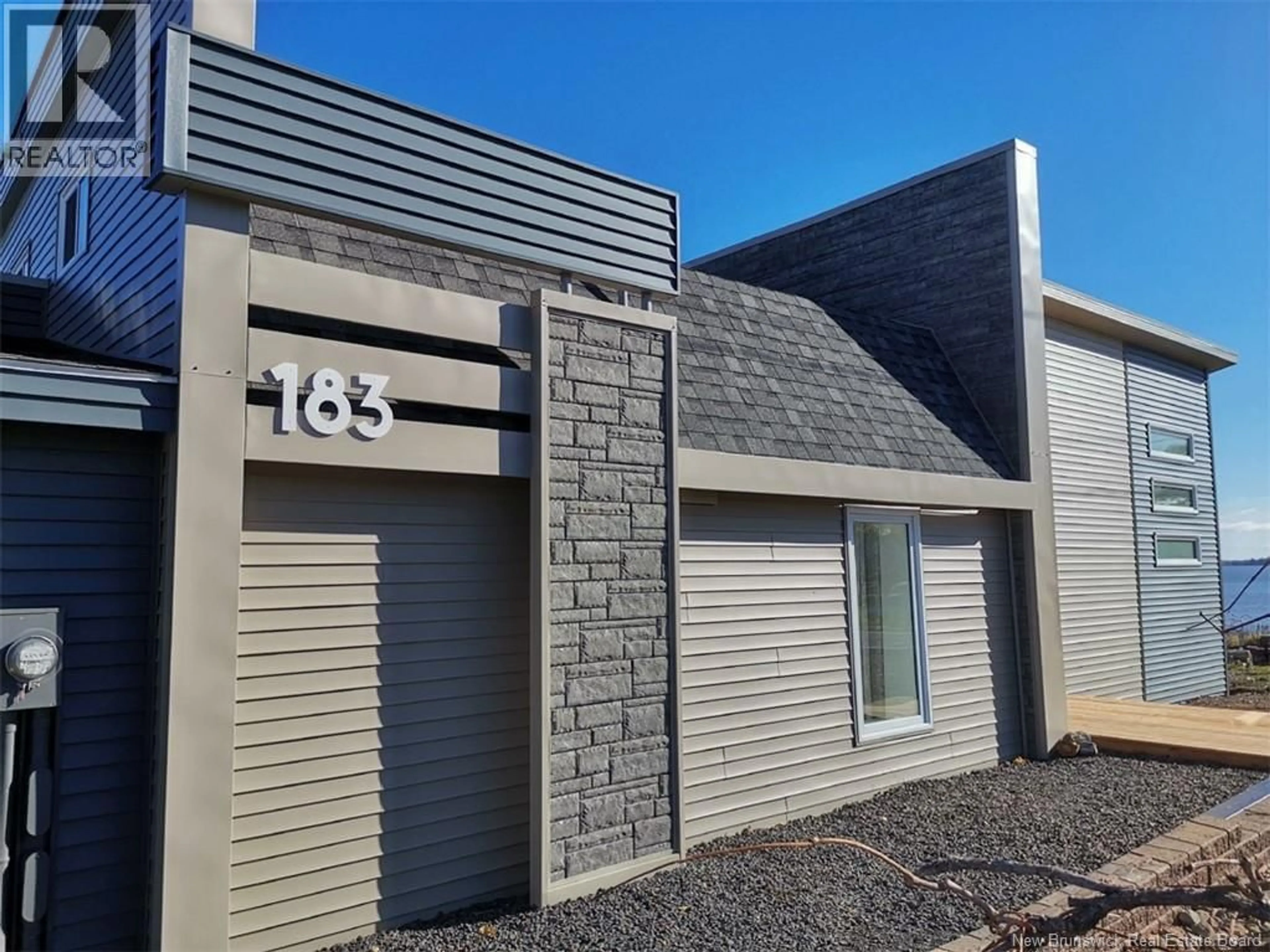 Home with vinyl exterior material, street for 183 CHALEUR STREET, Charlo New Brunswick E8E2B7