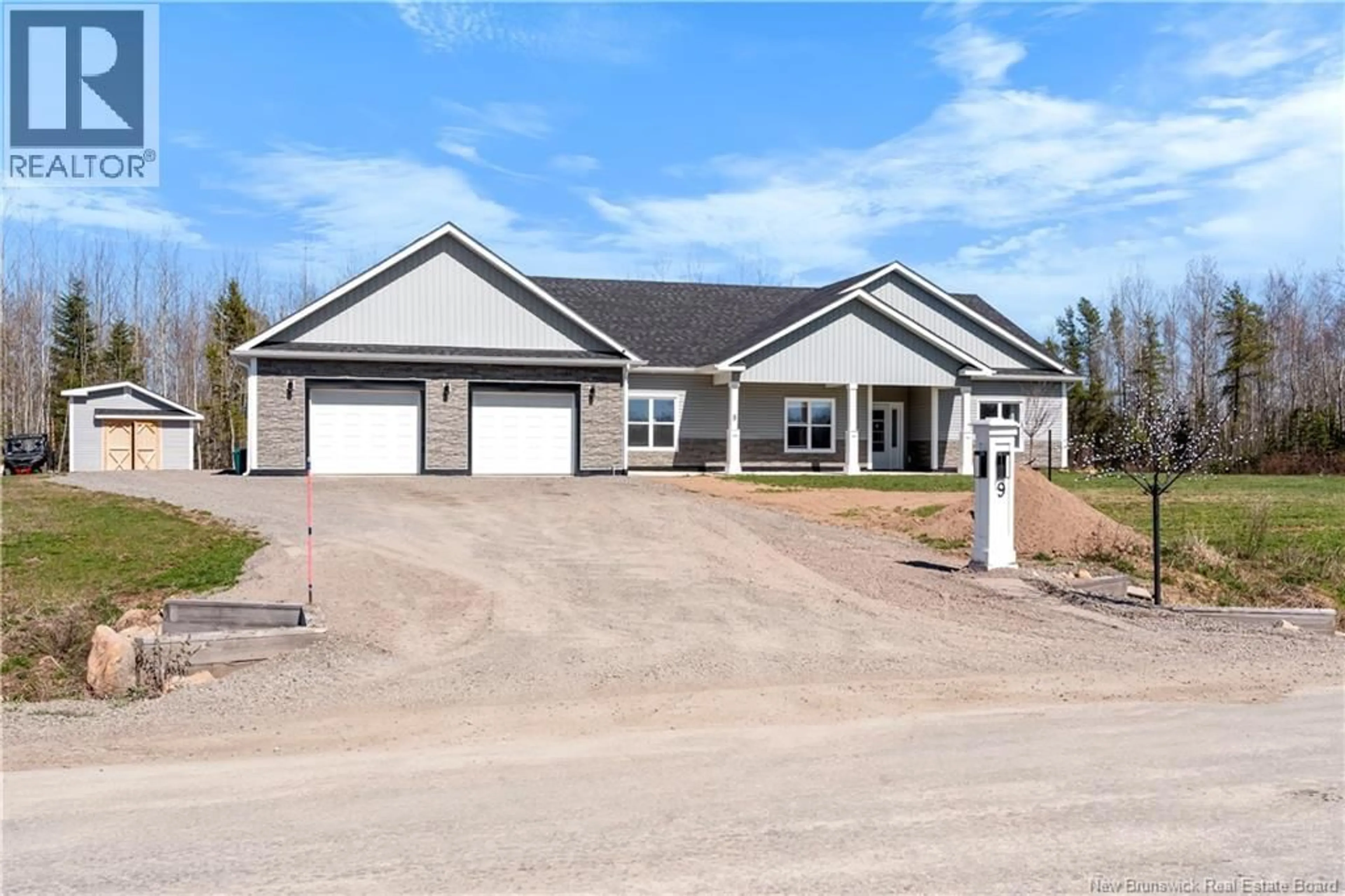 Home with vinyl exterior material, street for 9 FLYNN STREET, Pine Glen New Brunswick E1J0H5