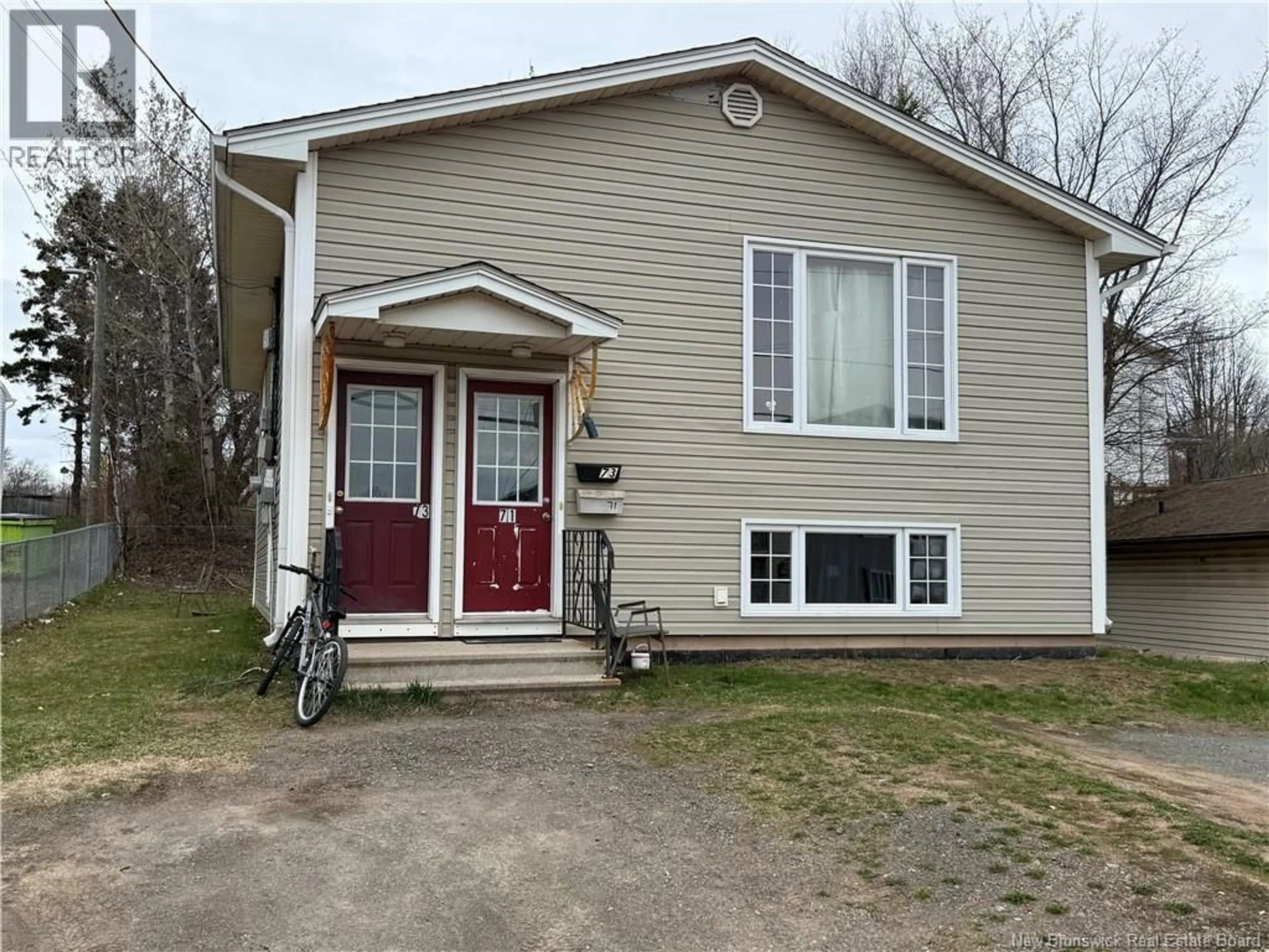 Home with vinyl exterior material, street for 71-73 MILL ROAD, Moncton New Brunswick E1A4A4