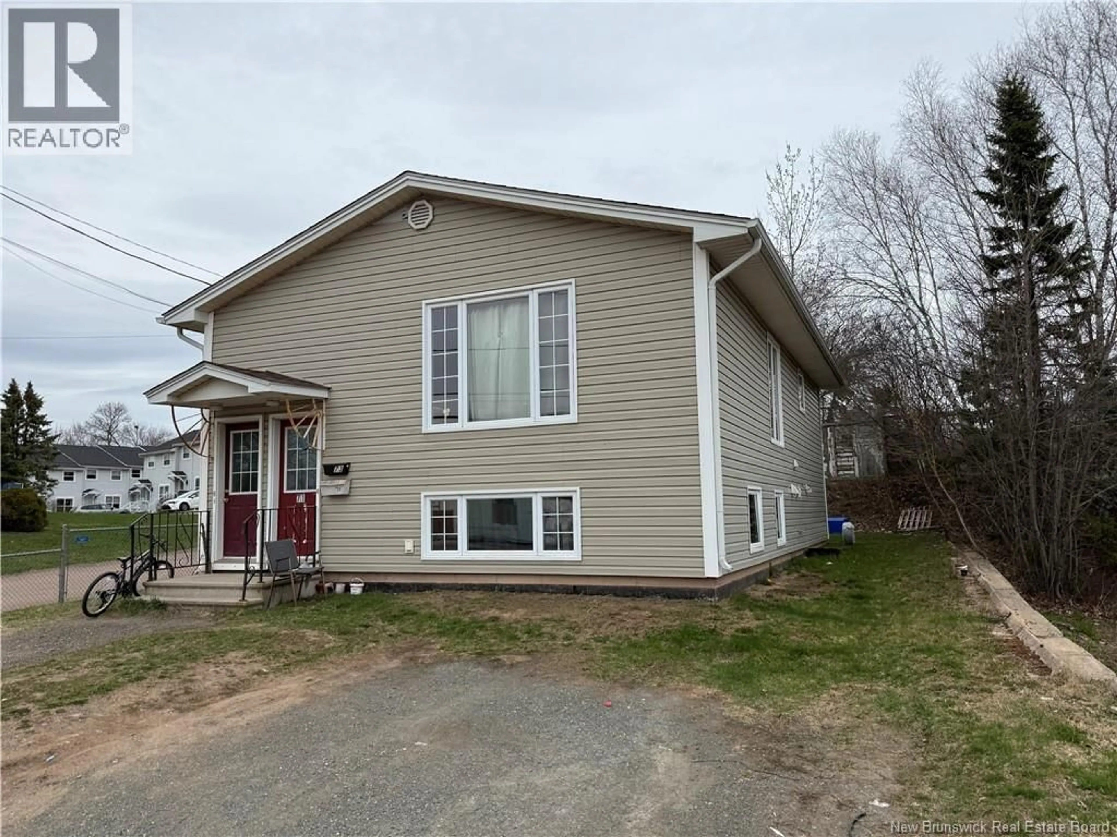 Home with vinyl exterior material, unknown for 71-73 MILL ROAD, Moncton New Brunswick E1A4A4