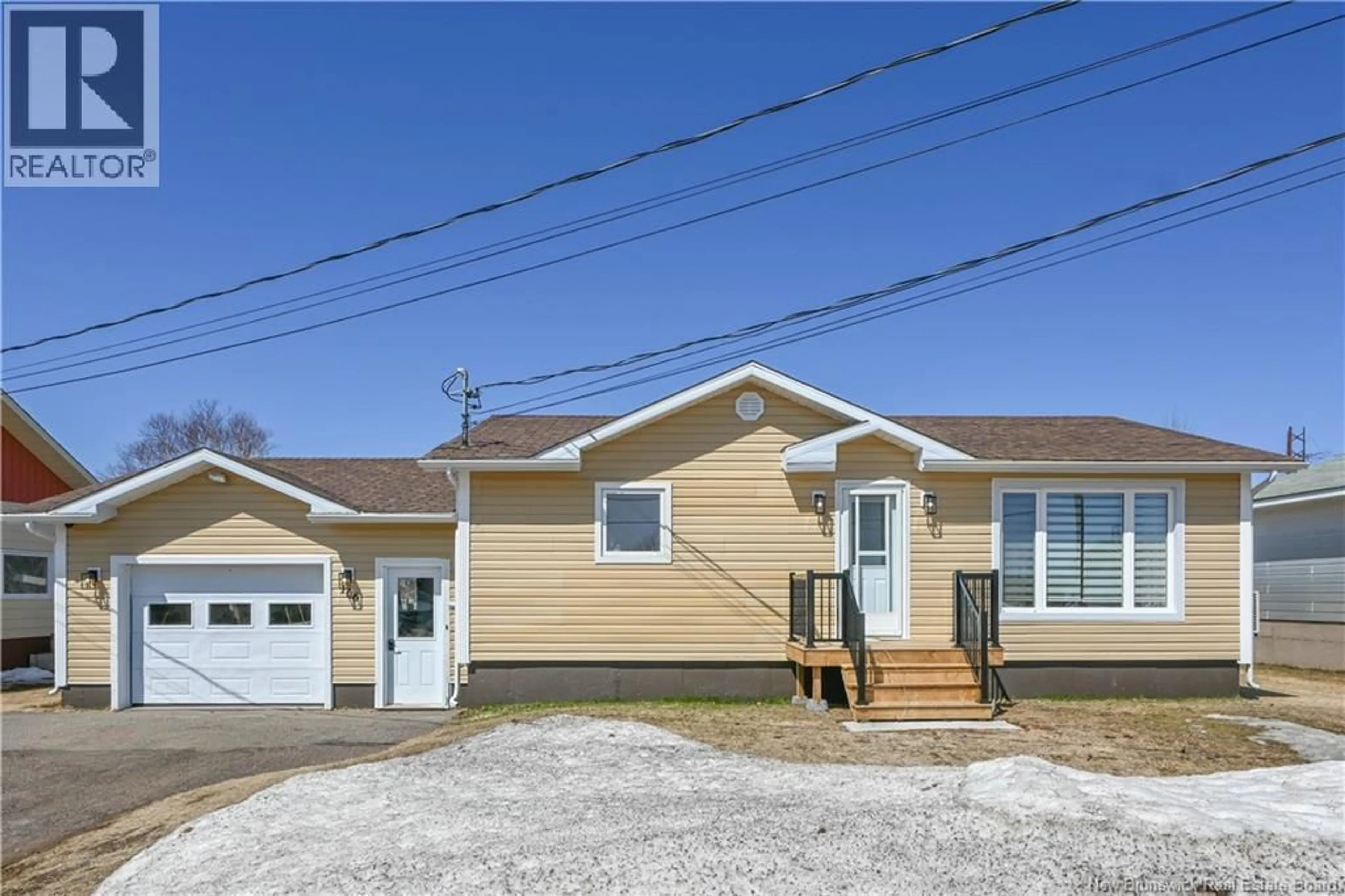 Home with vinyl exterior material, street for 106 DES CHAMPS STREET, Lamèque New Brunswick E8T1E7