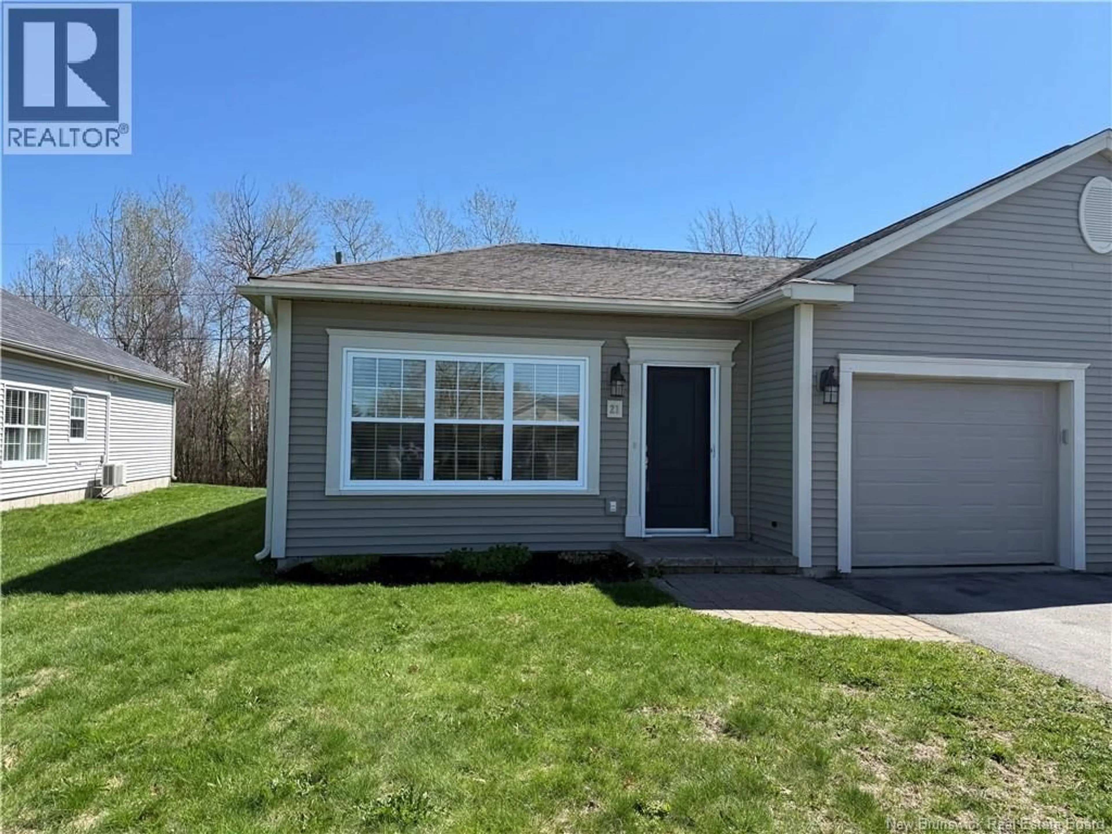 Home with vinyl exterior material, street for 21 MEADOW LANE, Sussex New Brunswick E4E1M0