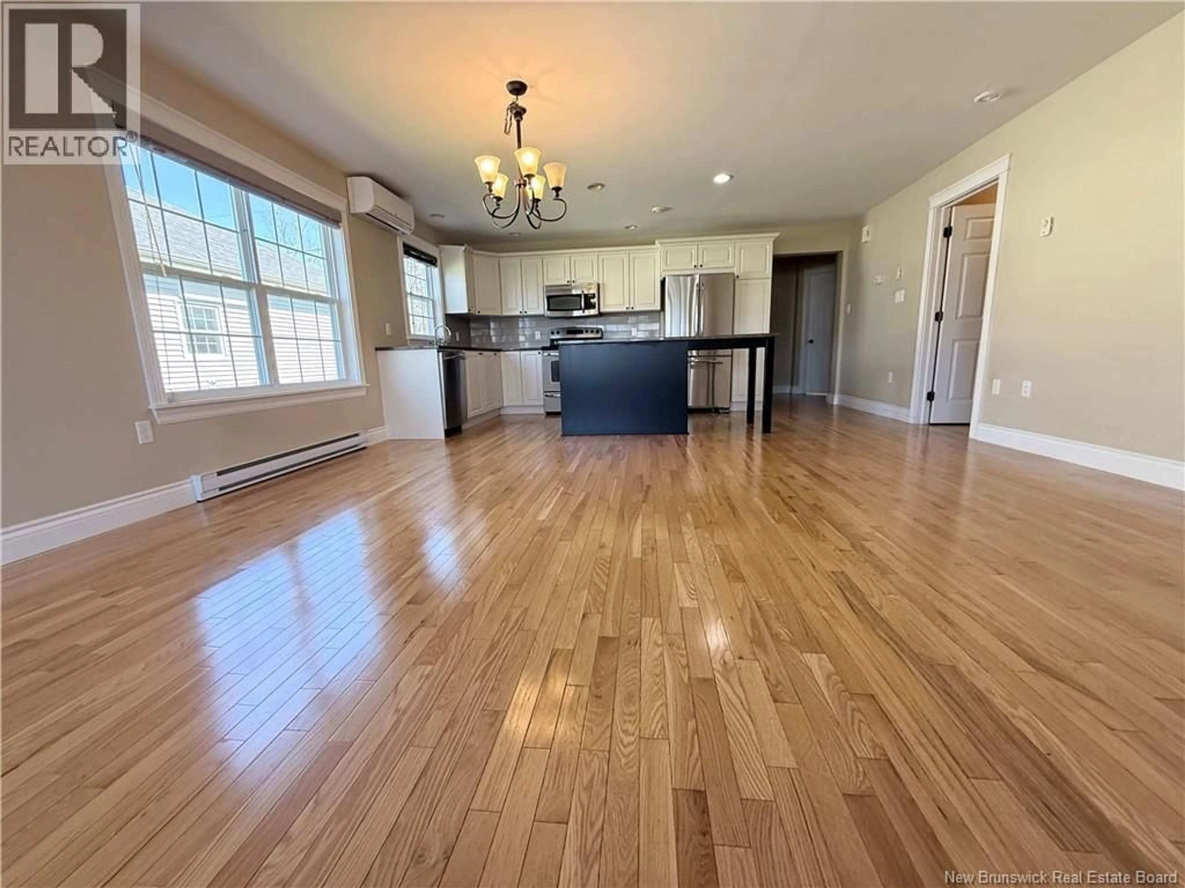 Open concept kitchen, wood/laminate floor for 21 MEADOW LANE, Sussex New Brunswick E4E1M0