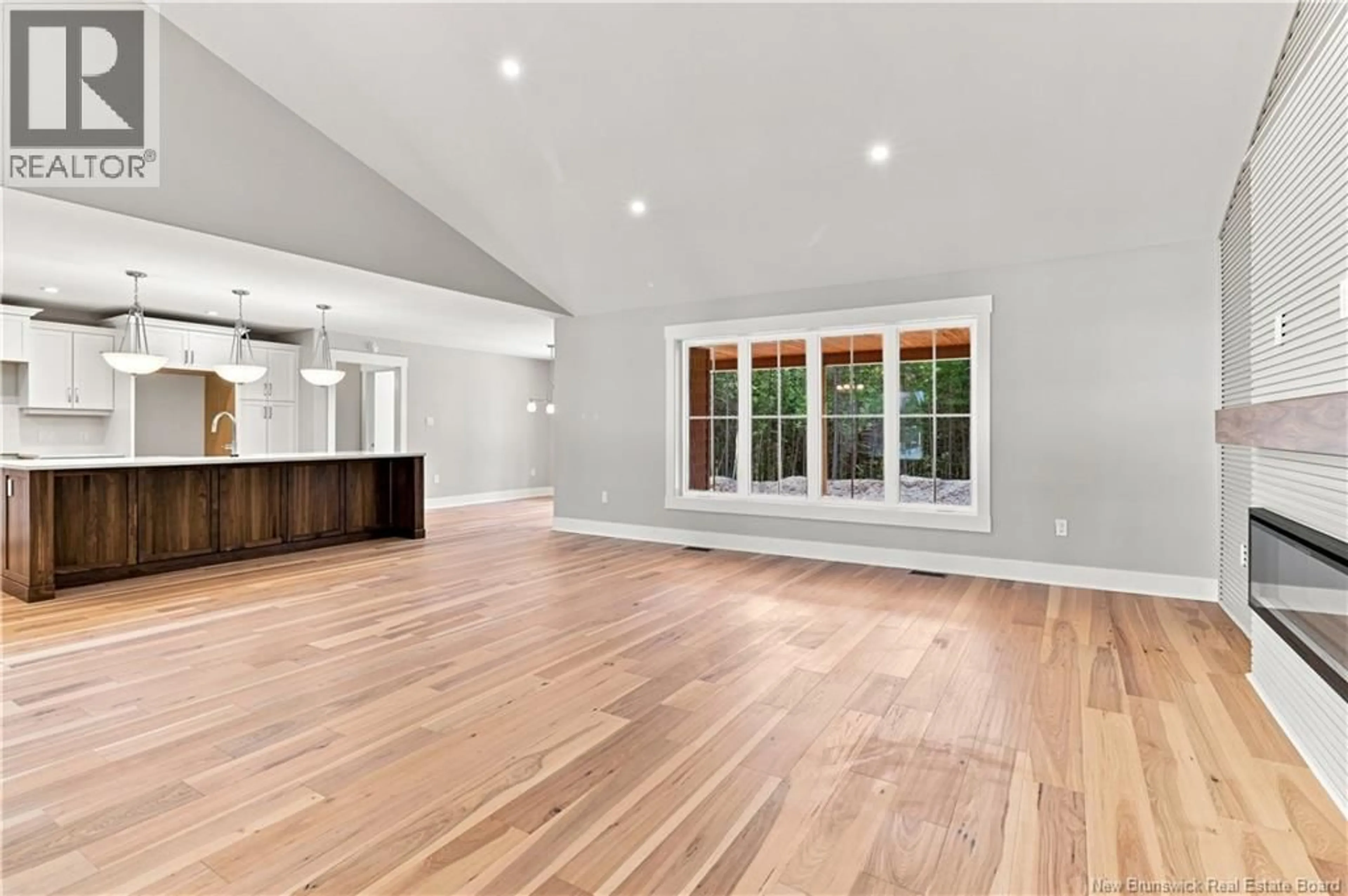 Open concept kitchen, wood/laminate floor for 158 STONEHILL LANE, Fredericton New Brunswick E3G0J6