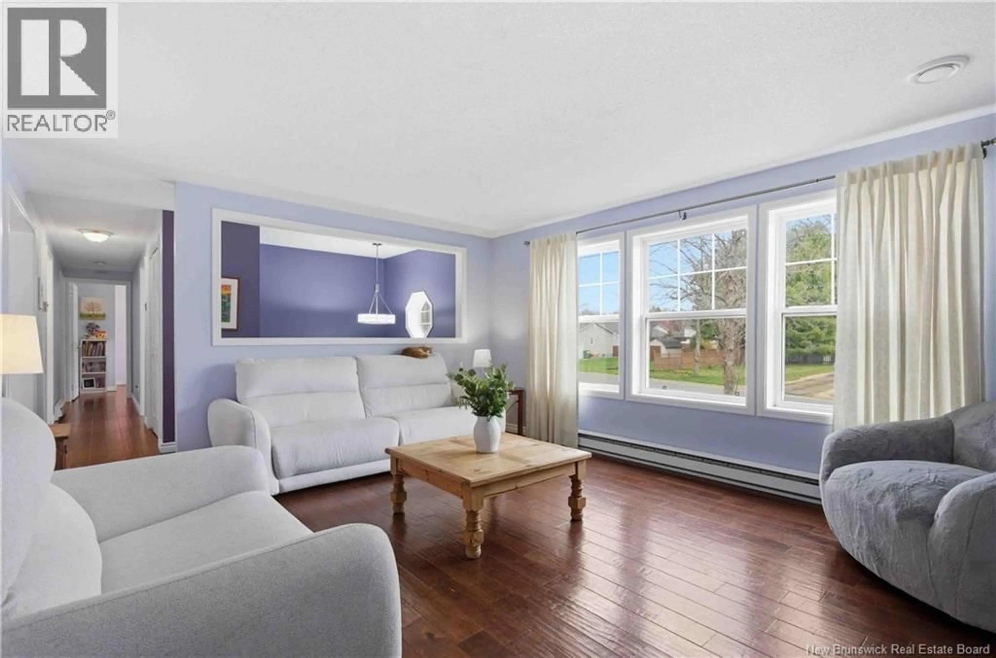 Living room with furniture, wood/laminate floor for 231 MCADAM AVENUE, Fredericton New Brunswick E3A5V1