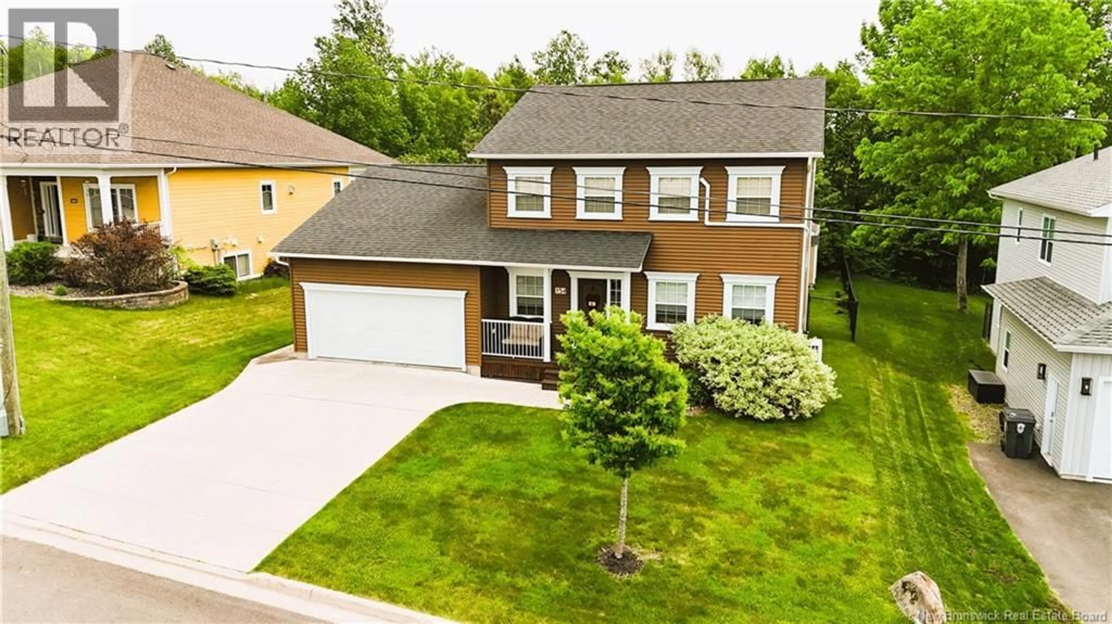 A pic from outside/outdoor area/front of a property/back of a property/a pic from drone, street for 154 MITCHELL WAYNE DRIVE, Fredericton New Brunswick E3G0B8