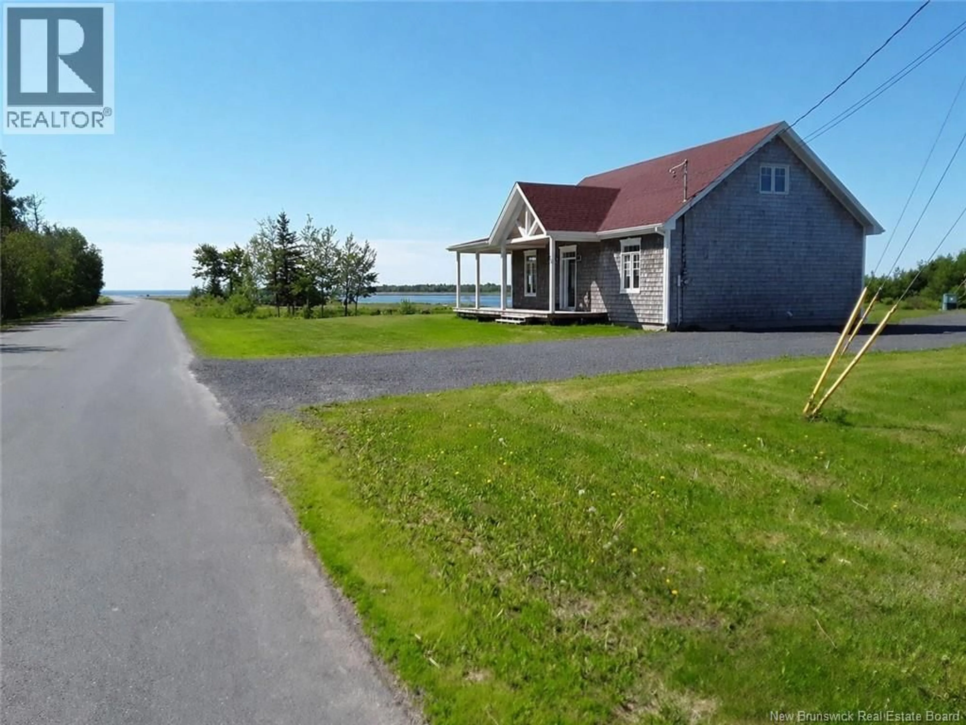 A pic from outside/outdoor area/front of a property/back of a property/a pic from drone, water/lake/river/ocean view for 74 JOSEPH STREET, Neguac New Brunswick E9G1J1