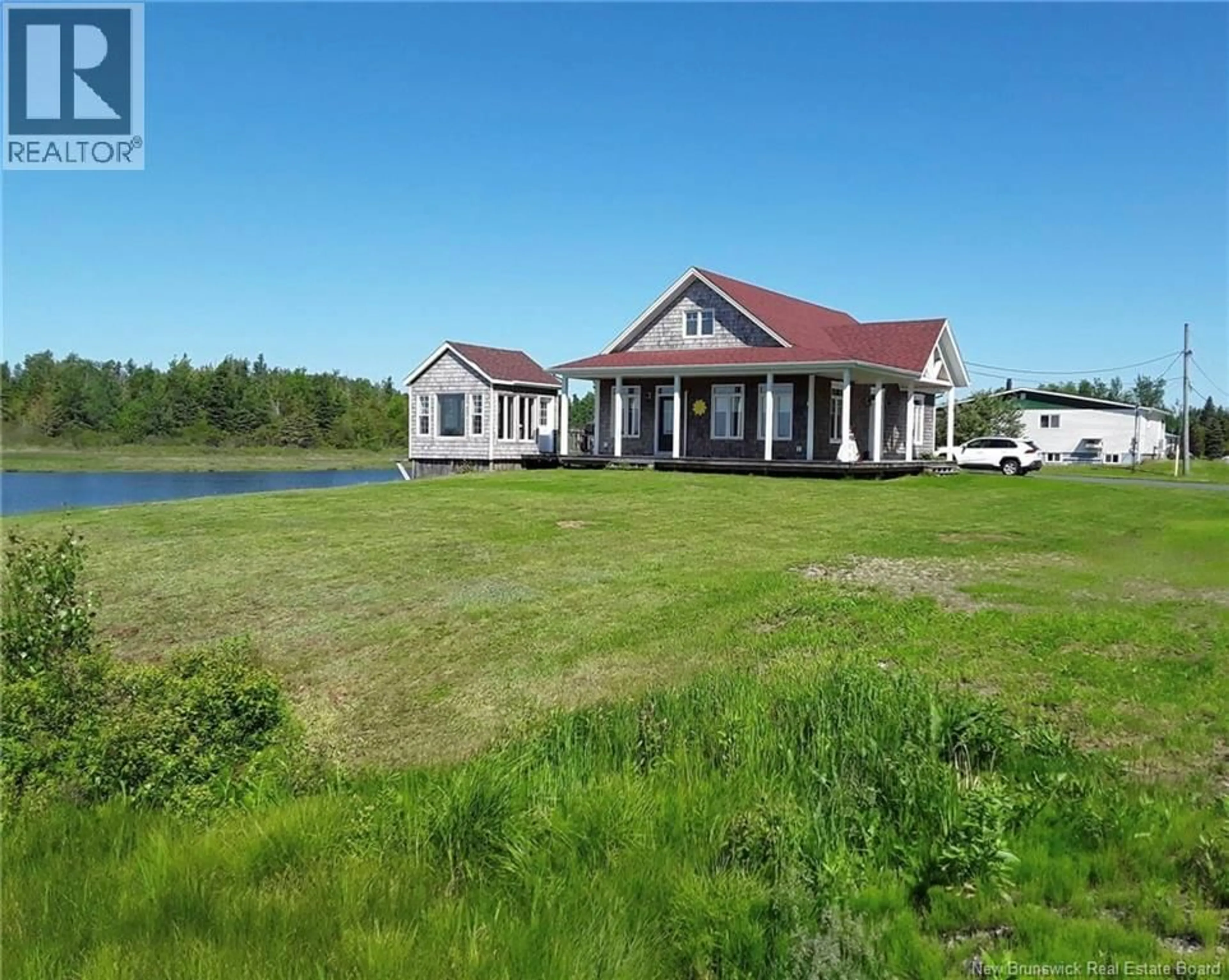 A pic from outside/outdoor area/front of a property/back of a property/a pic from drone, water/lake/river/ocean view for 74 JOSEPH STREET, Neguac New Brunswick E9G1J1