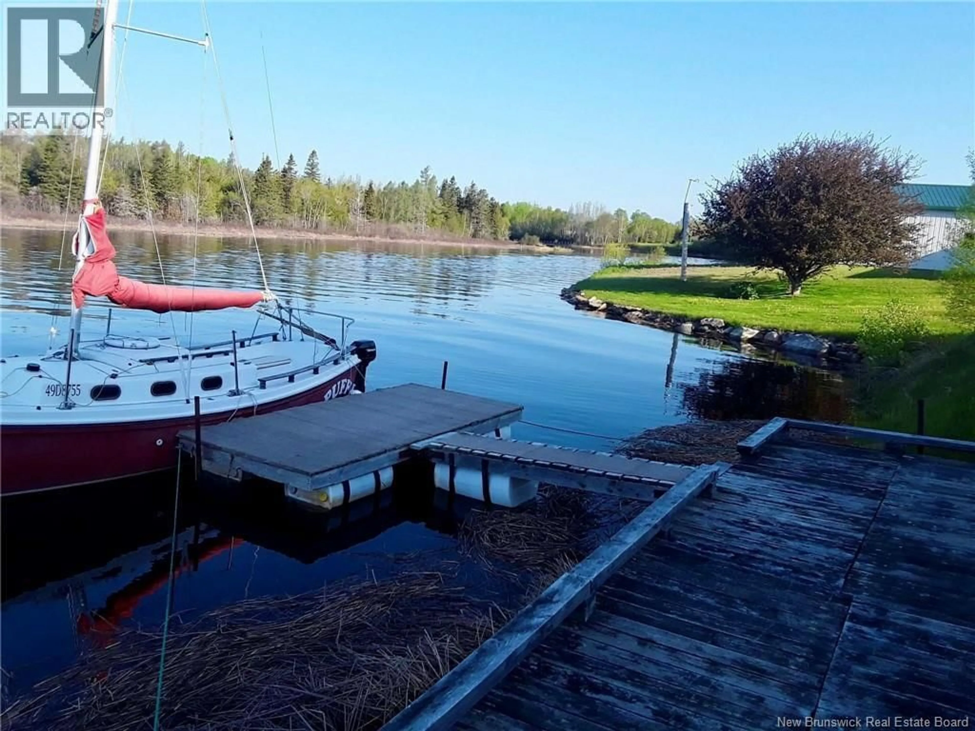 A pic from outside/outdoor area/front of a property/back of a property/a pic from drone, water/lake/river/ocean view for 74 JOSEPH STREET, Neguac New Brunswick E9G1J1