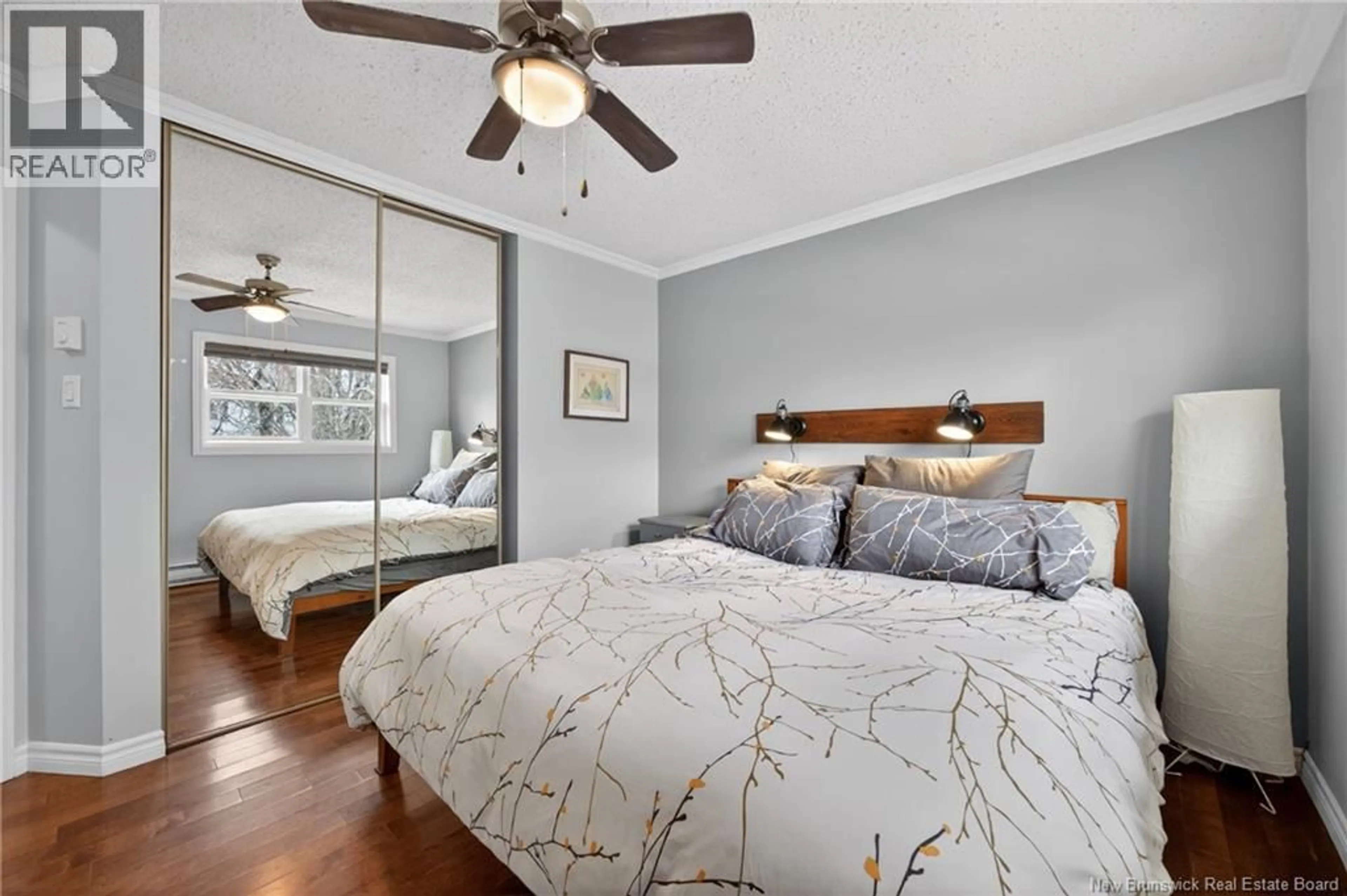 Bedroom with bed, wood/laminate floor for 101 PUGSLEY STREET, Fredericton New Brunswick E3B6T2
