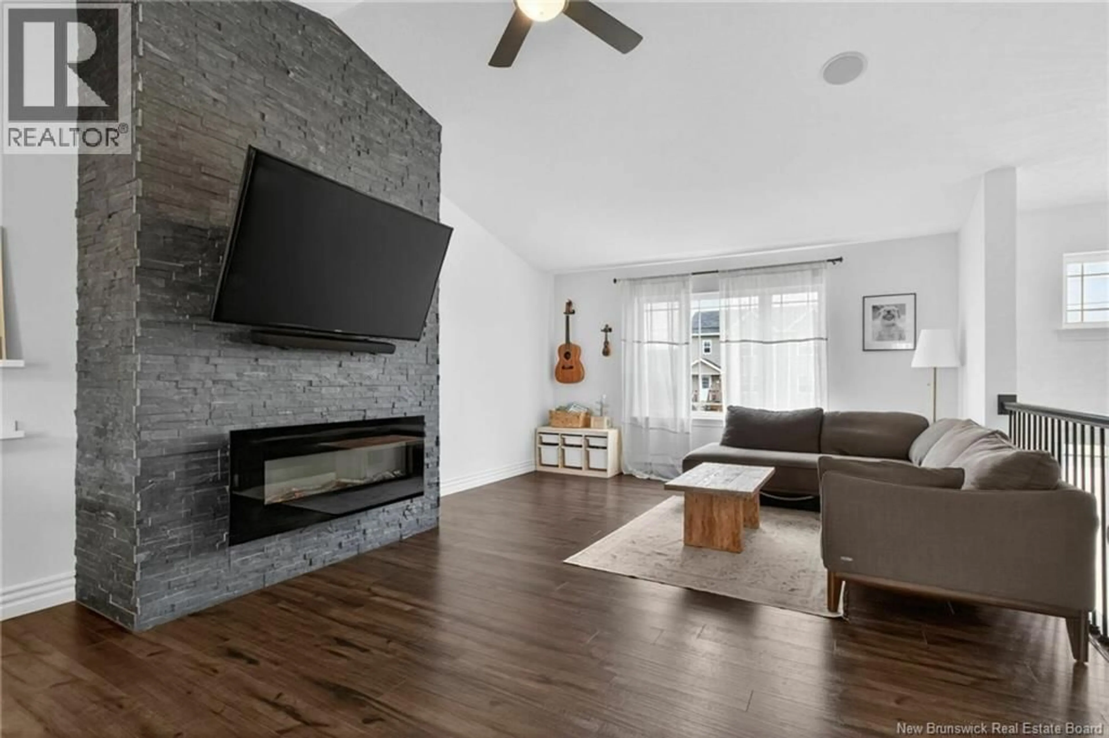 Living room with furniture, unknown for 65 BREVET STREET, Moncton New Brunswick E1G5S5