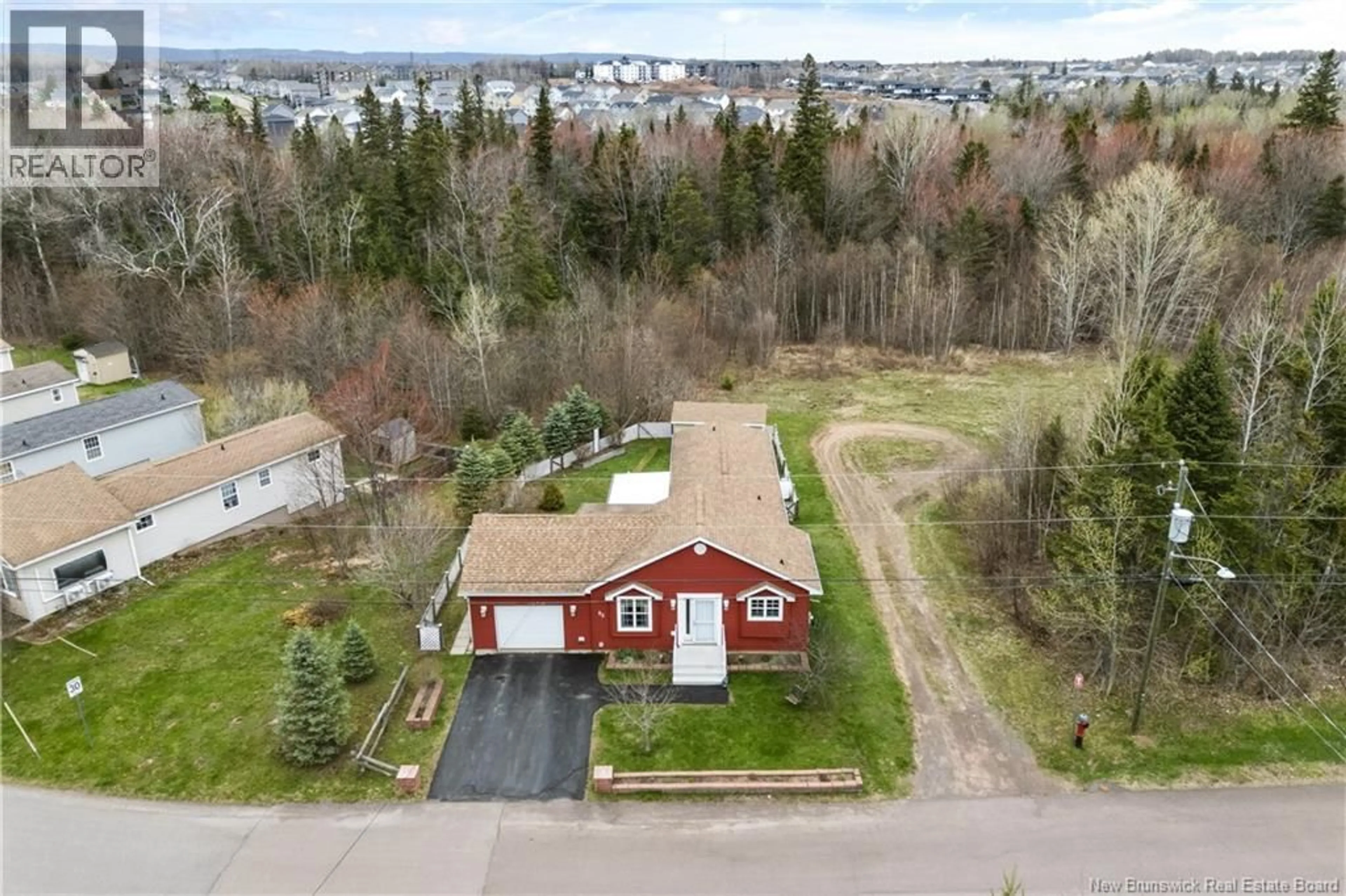 A pic from outside/outdoor area/front of a property/back of a property/a pic from drone, street for 83 SEQUOIA DRIVE, Moncton New Brunswick E1E0A1